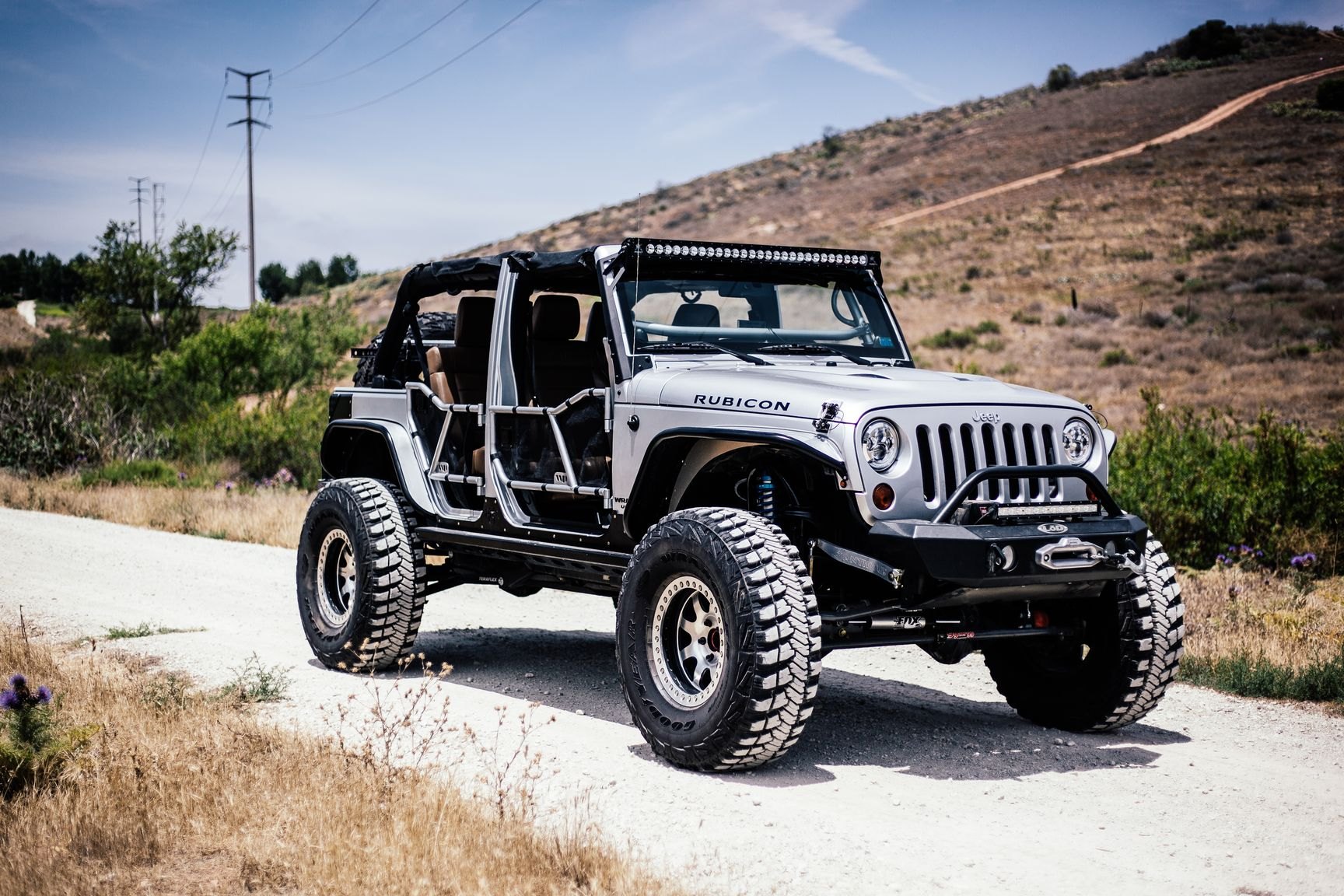 Custom Gray Lifted Jeep Wrangler on Goodyear Tires - Photo by Rebel Off-Road