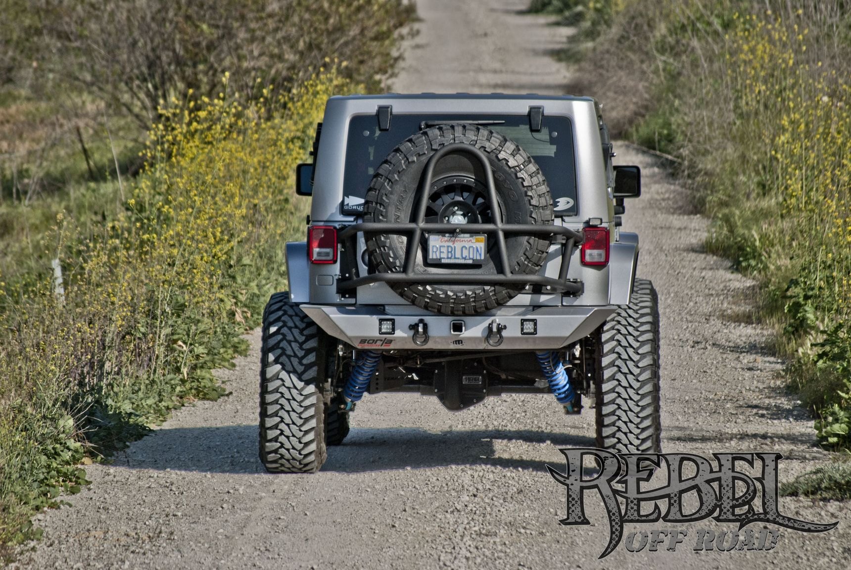 Rear Bumper with LED Lights on Gray Lifted Jeep Wrangler - Photo by Rebel Off-Road
