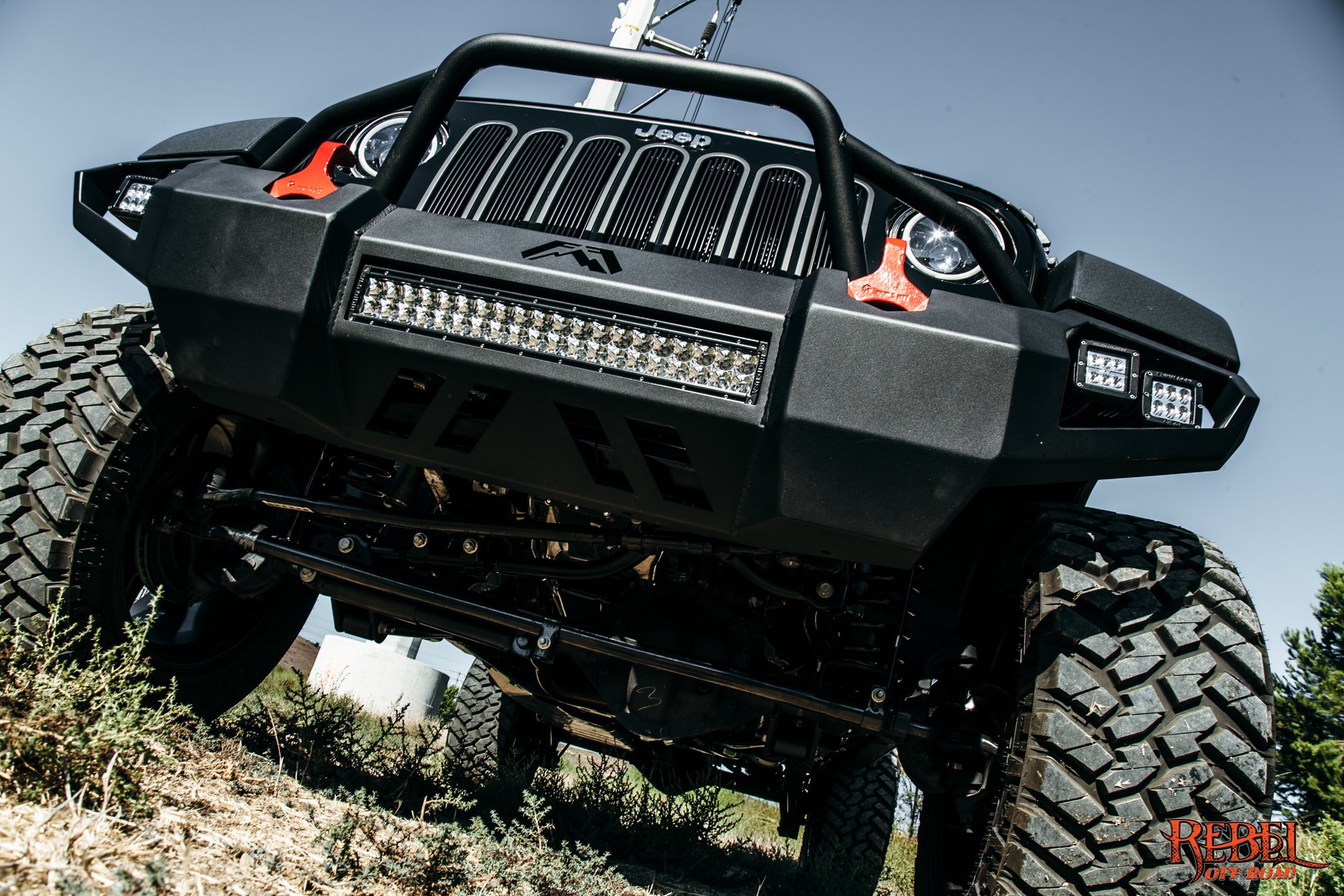 Black Lifted Jeep Wrangler with Custom Suspension Kit - Photo by Rebel Off-Road