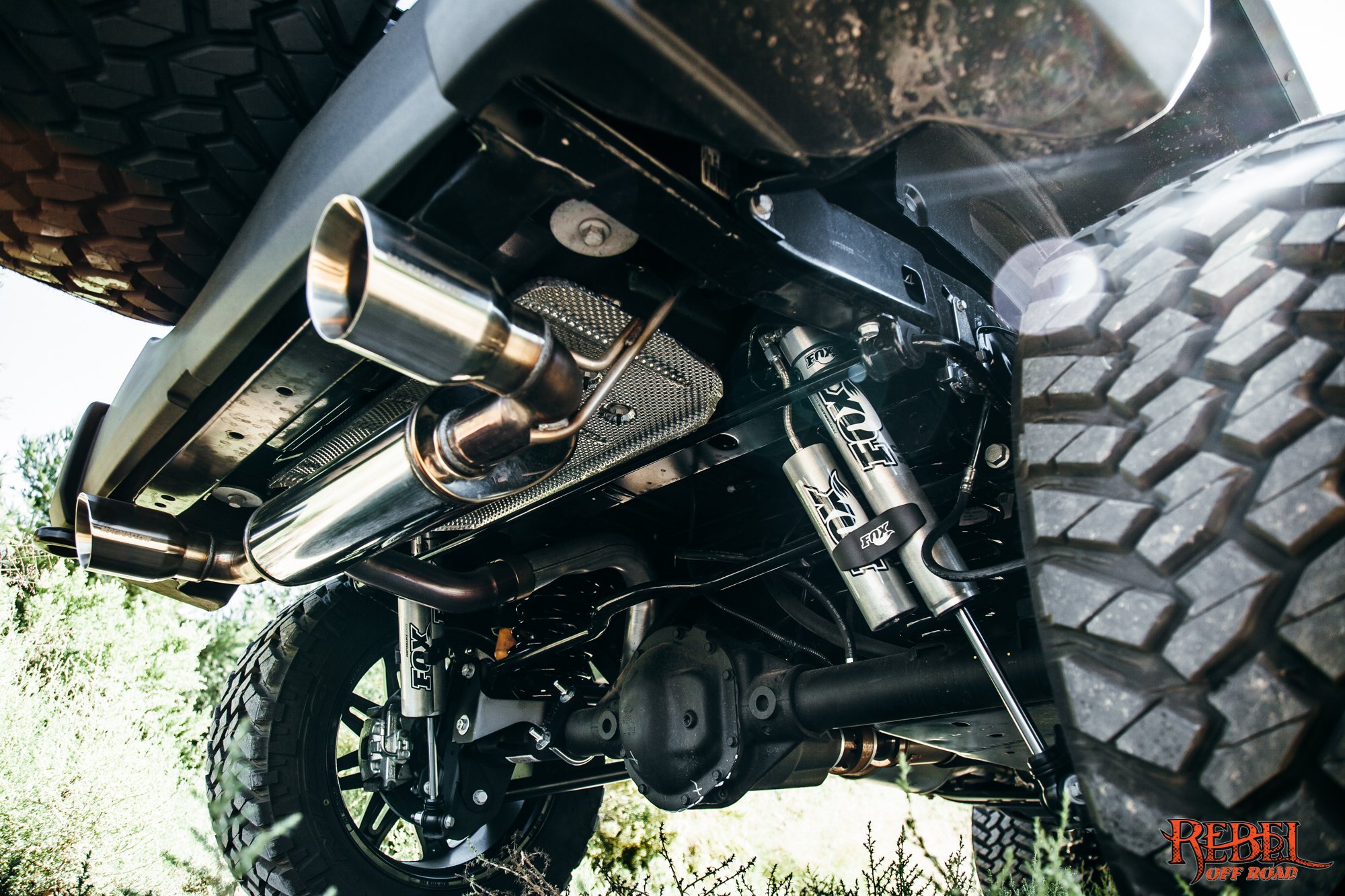 Fox Shocks on Black Lifted Jeep Wrangler - Photo by Rebel Off-Road