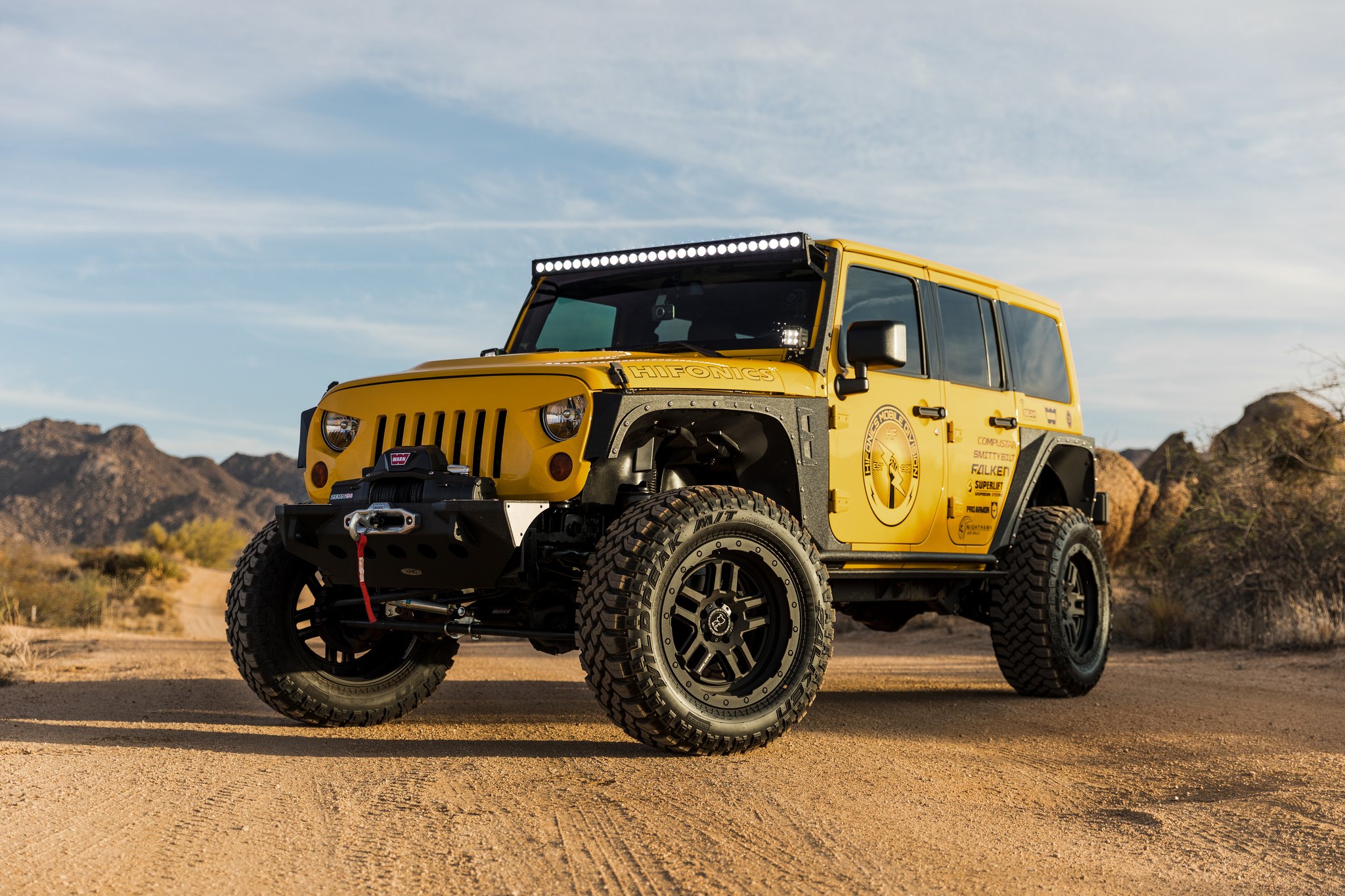 Off-Road Front Bumper with Warn Winch on Jeep Wrangler - Photo by Black Rhino Wheels