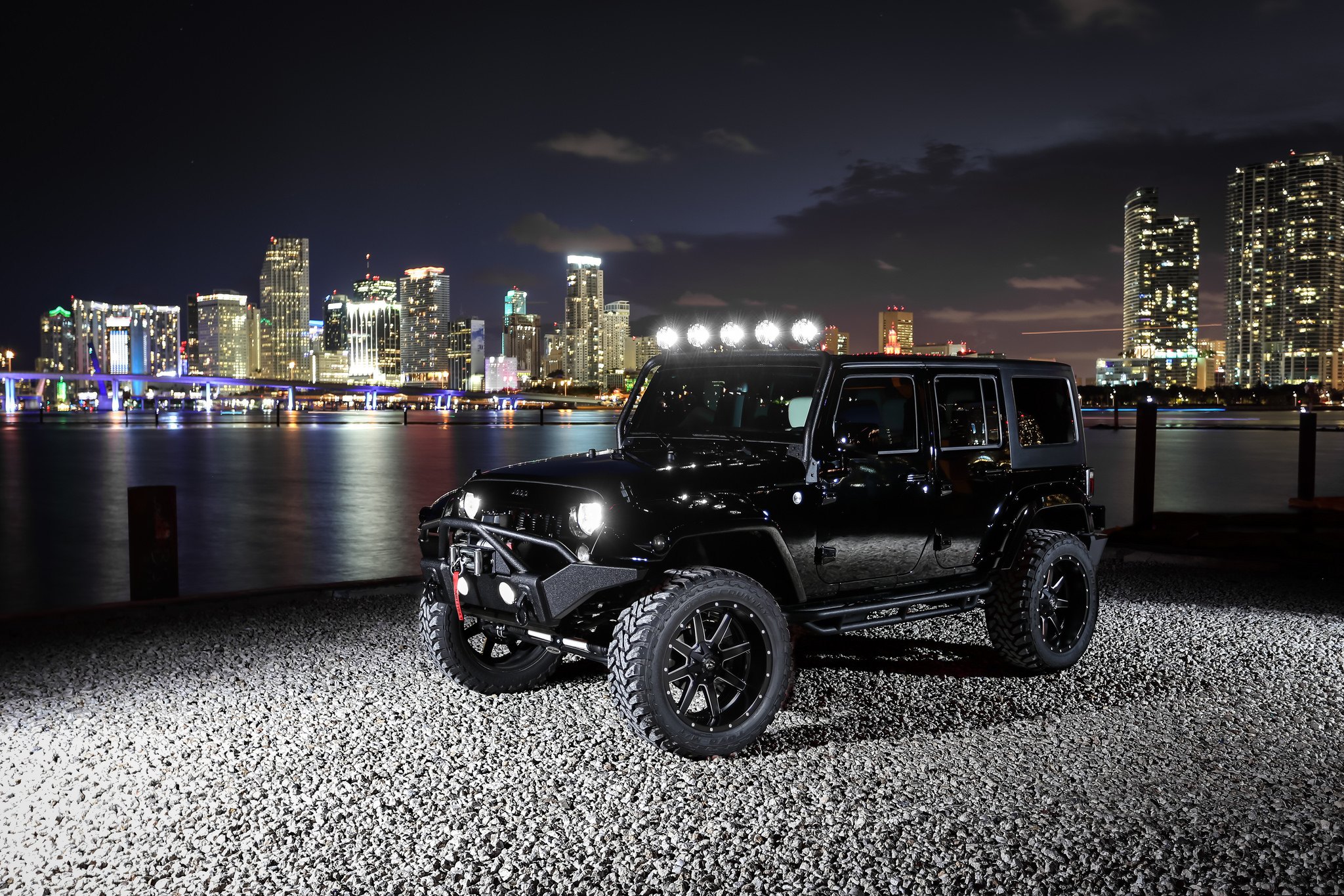 Menacing All Black JK Wrangler With Steel Bumpers, Lift and Large Tires —   Gallery