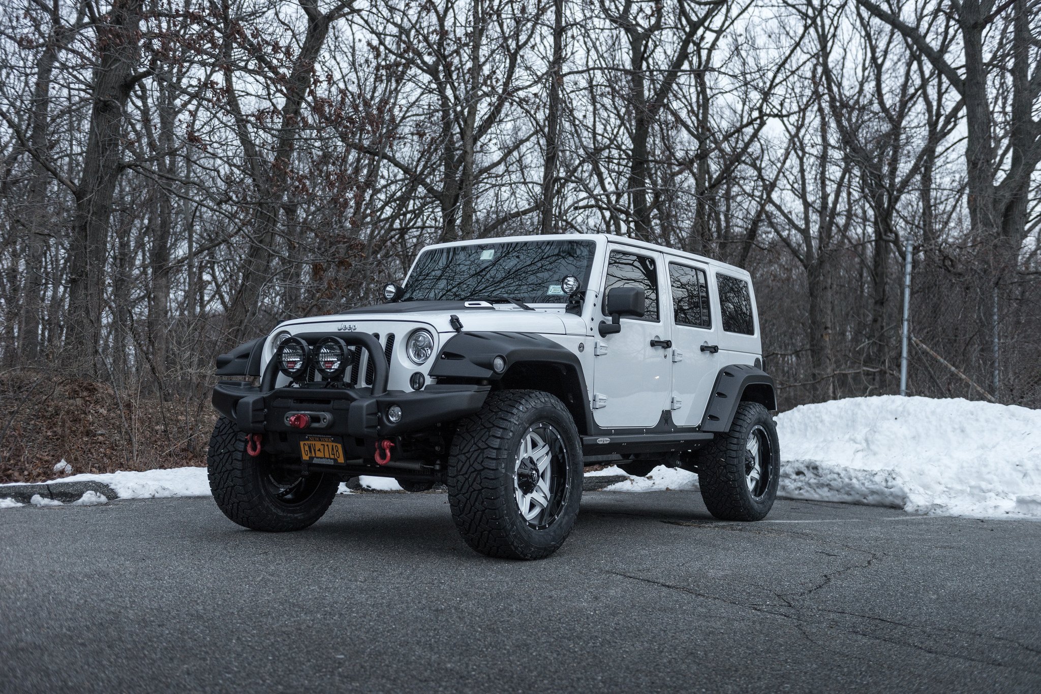 Gray Jeep Wrangler Unlimited with Aftermarket Fender Flares - Photo by Fuel Offroad