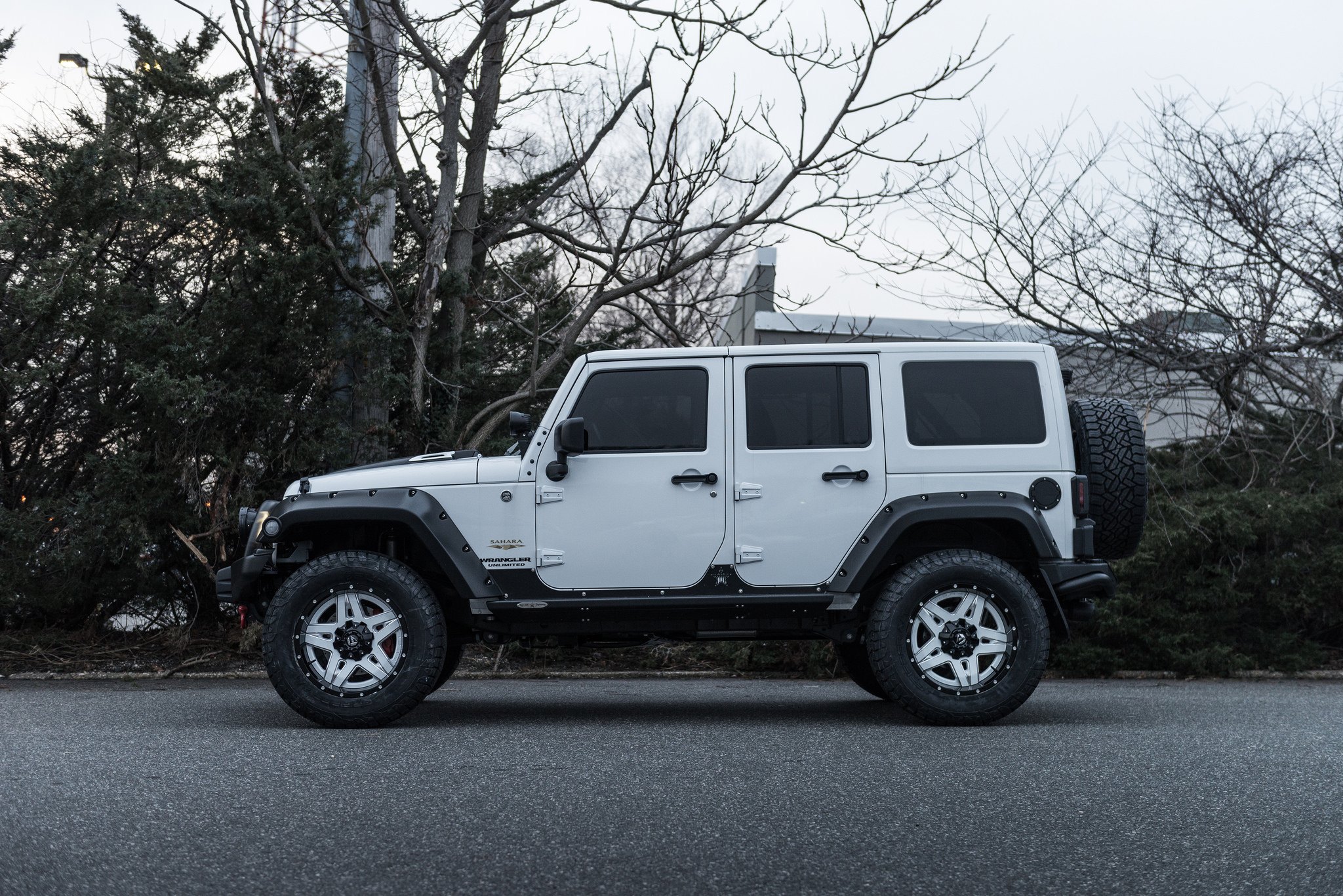 Custom Running Boards on Gray Jeep Wrangler - Photo by Fuel Offroad