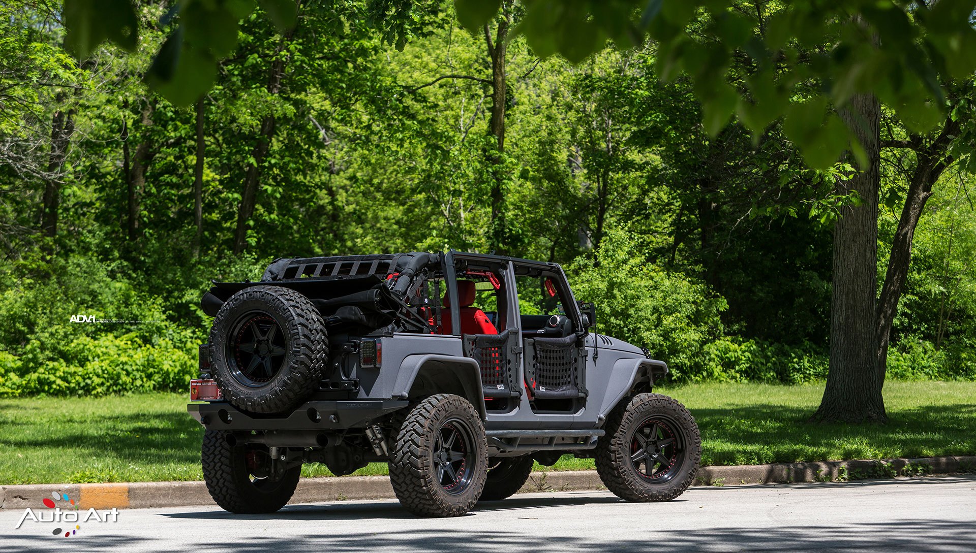 Gray Jeep Wrangler with Spare Tire Kit - Photo by ADV.1