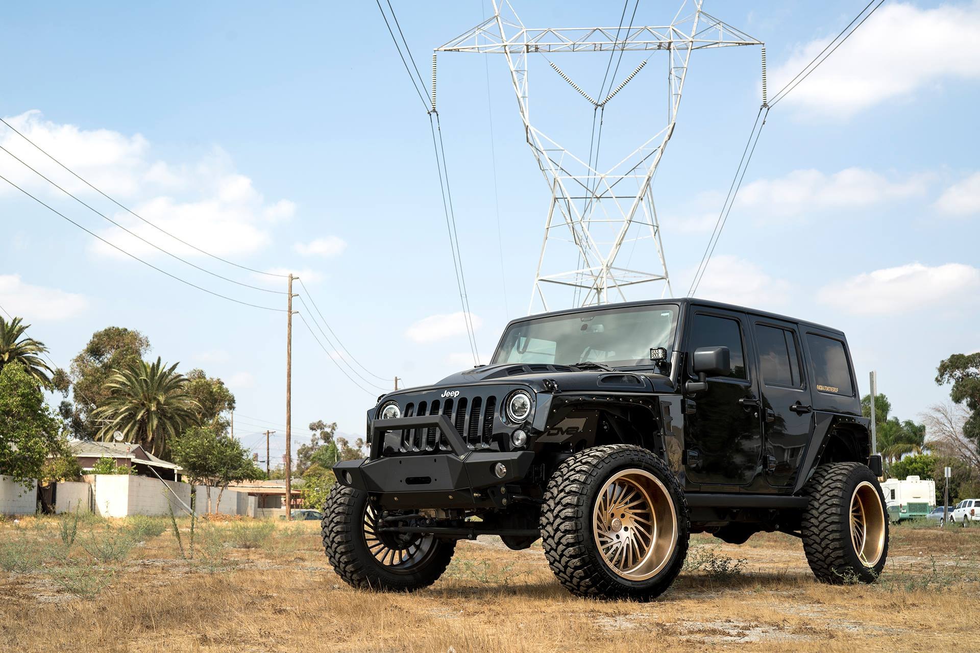 Black Jeep Wrangler with Off-road Winch Front Bumper - Photo by Forgiato