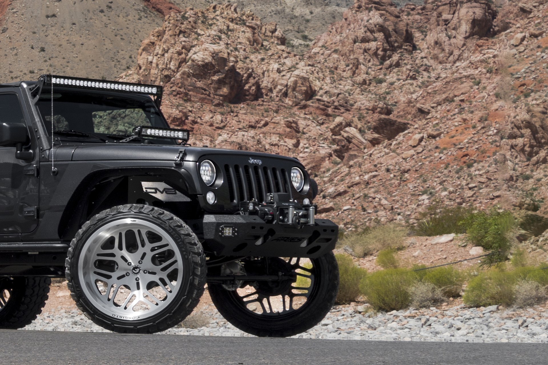 Chrome Forgiato Wheels on Black Lifted Jeep Wrangler - Photo by Forgiato