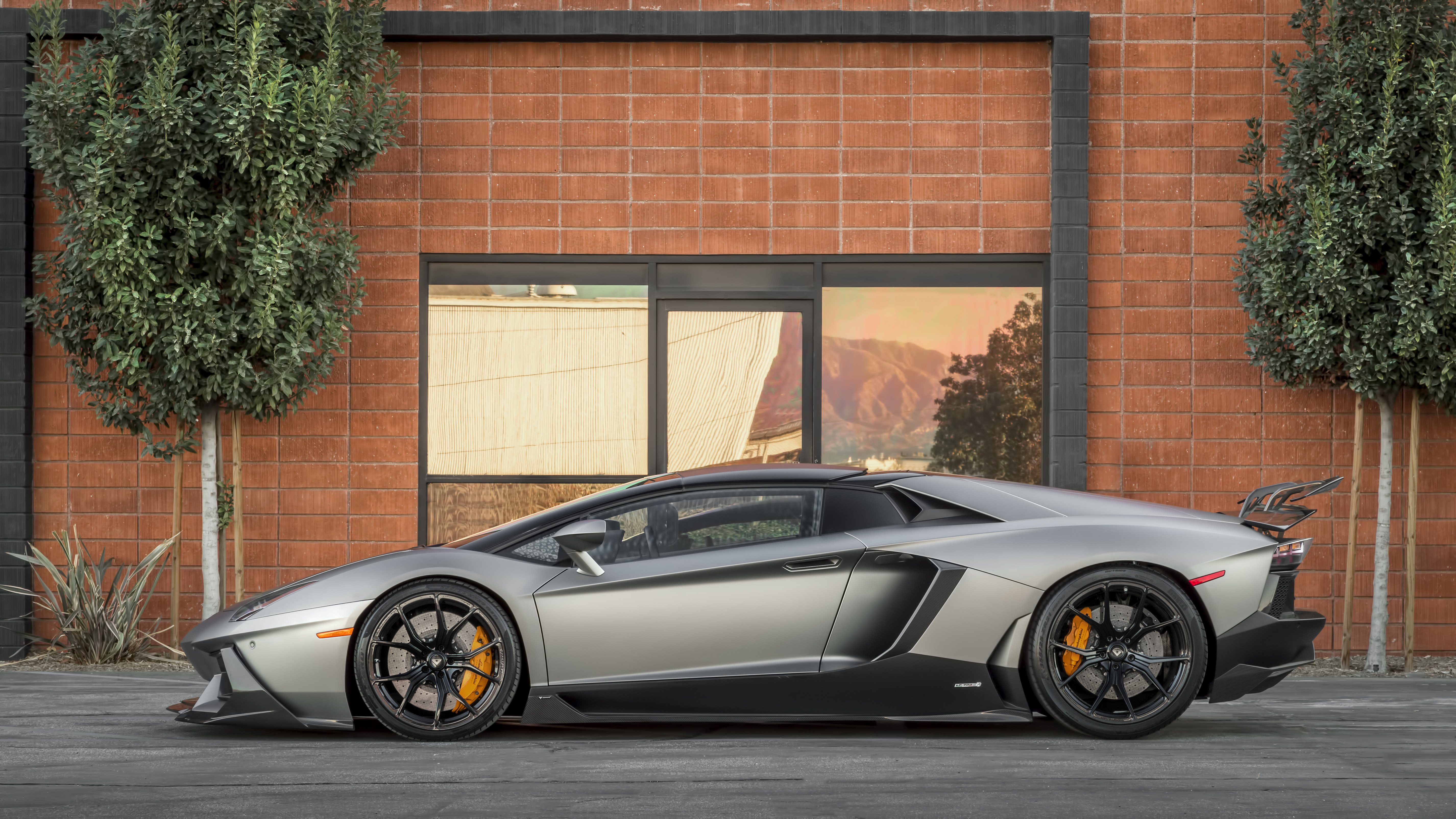 Carbon Fiber Side Skirts on Gray Lamborghini Aventador - Photo by Vorstiner