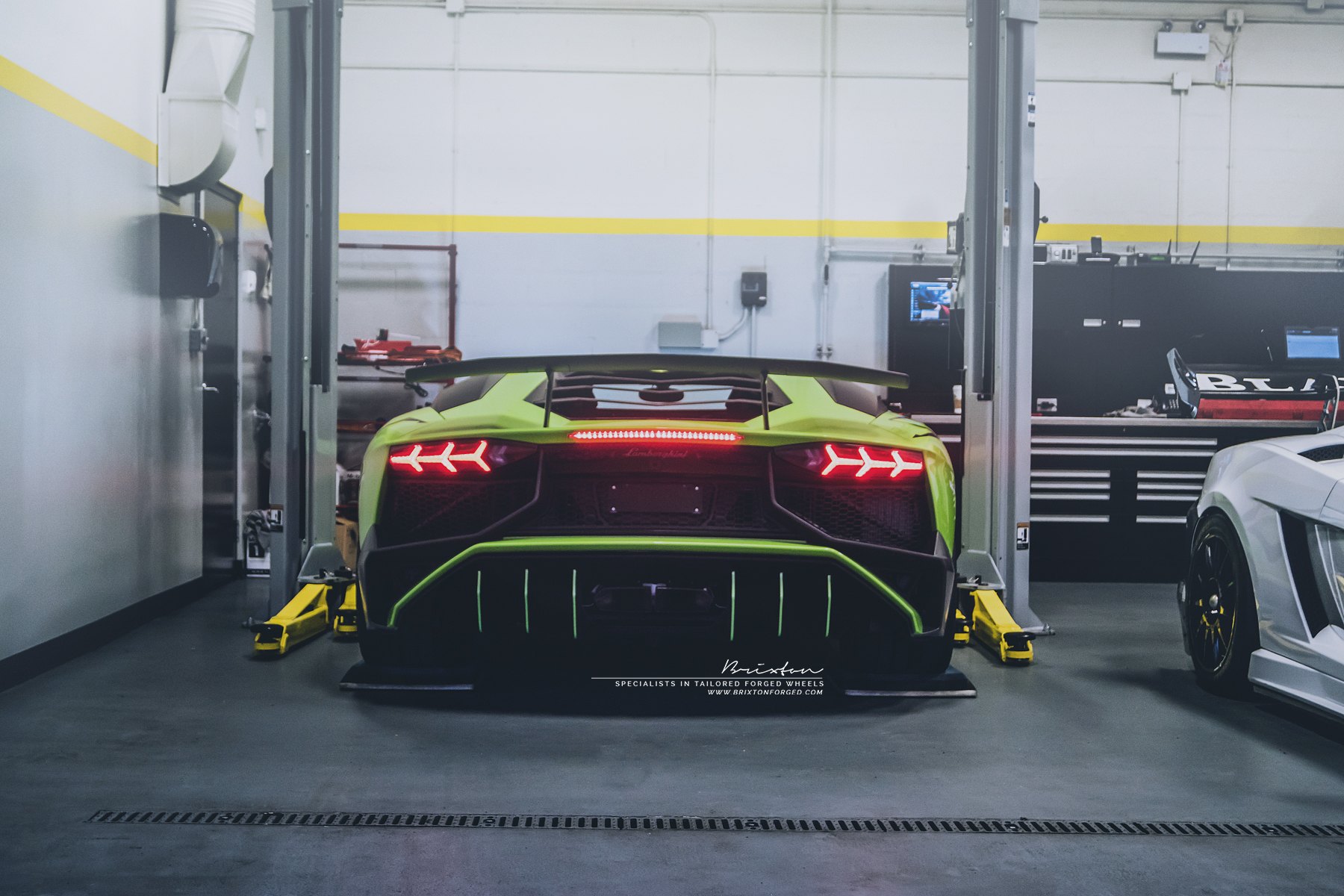 Large Wing Spoiler on Green Lamborghini Aventador - Photo by Brixton Forged Wheels
