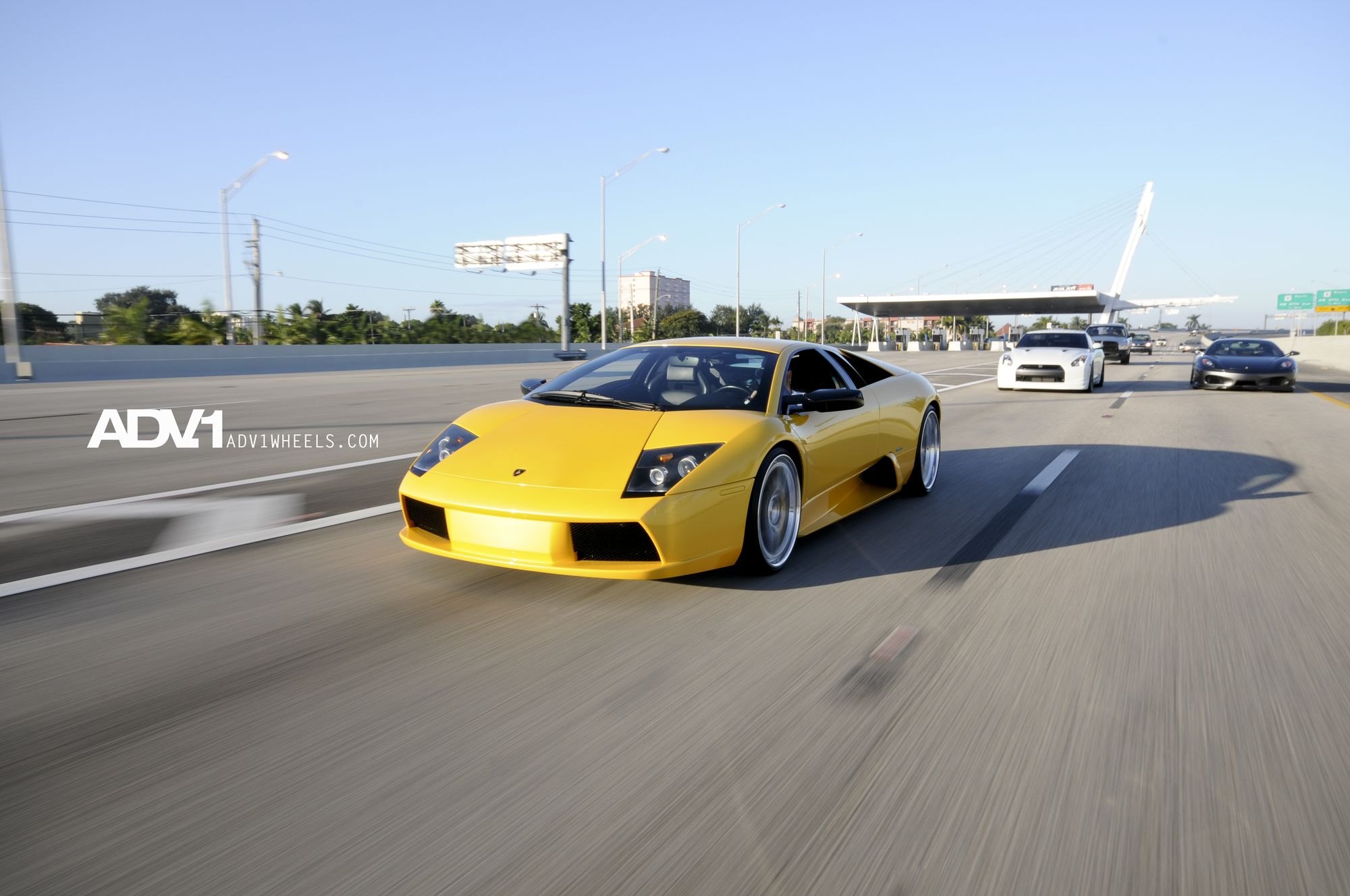 Aftermarket Headlights on Yellow Lamborghini Murcielago - Photo by ADV.1