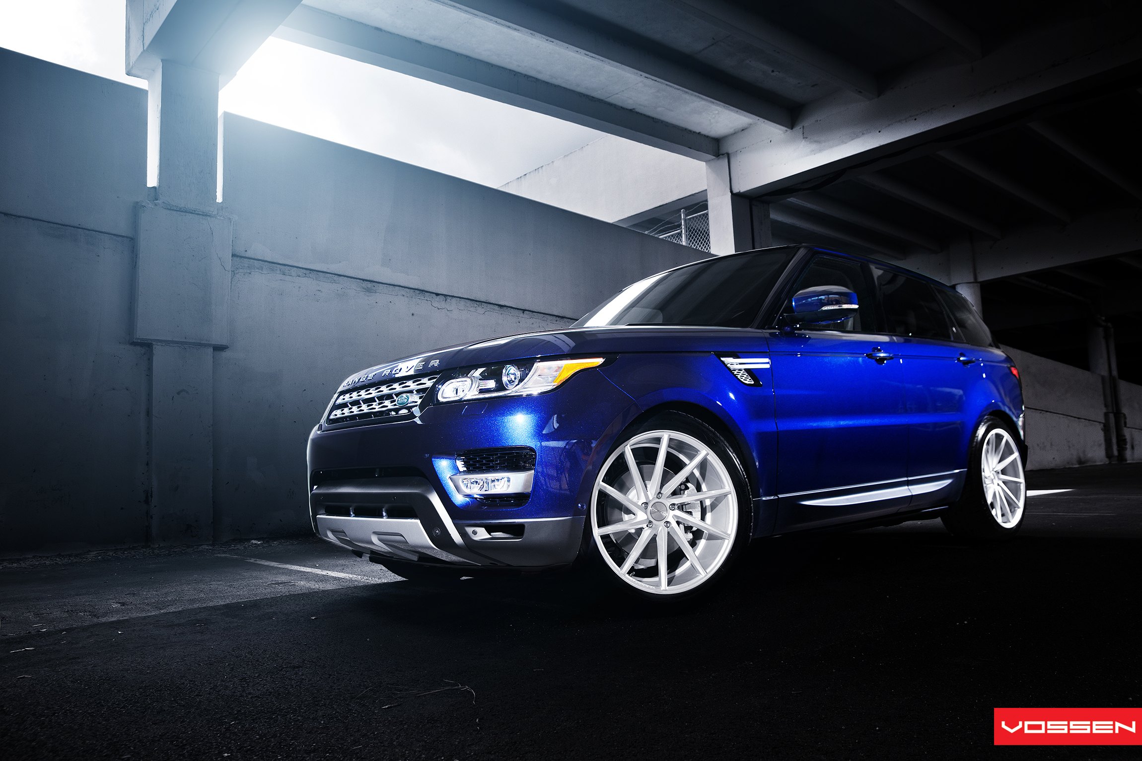 Custom Blue Land Rover Sport with Bumper Guard - Photo by Vossen