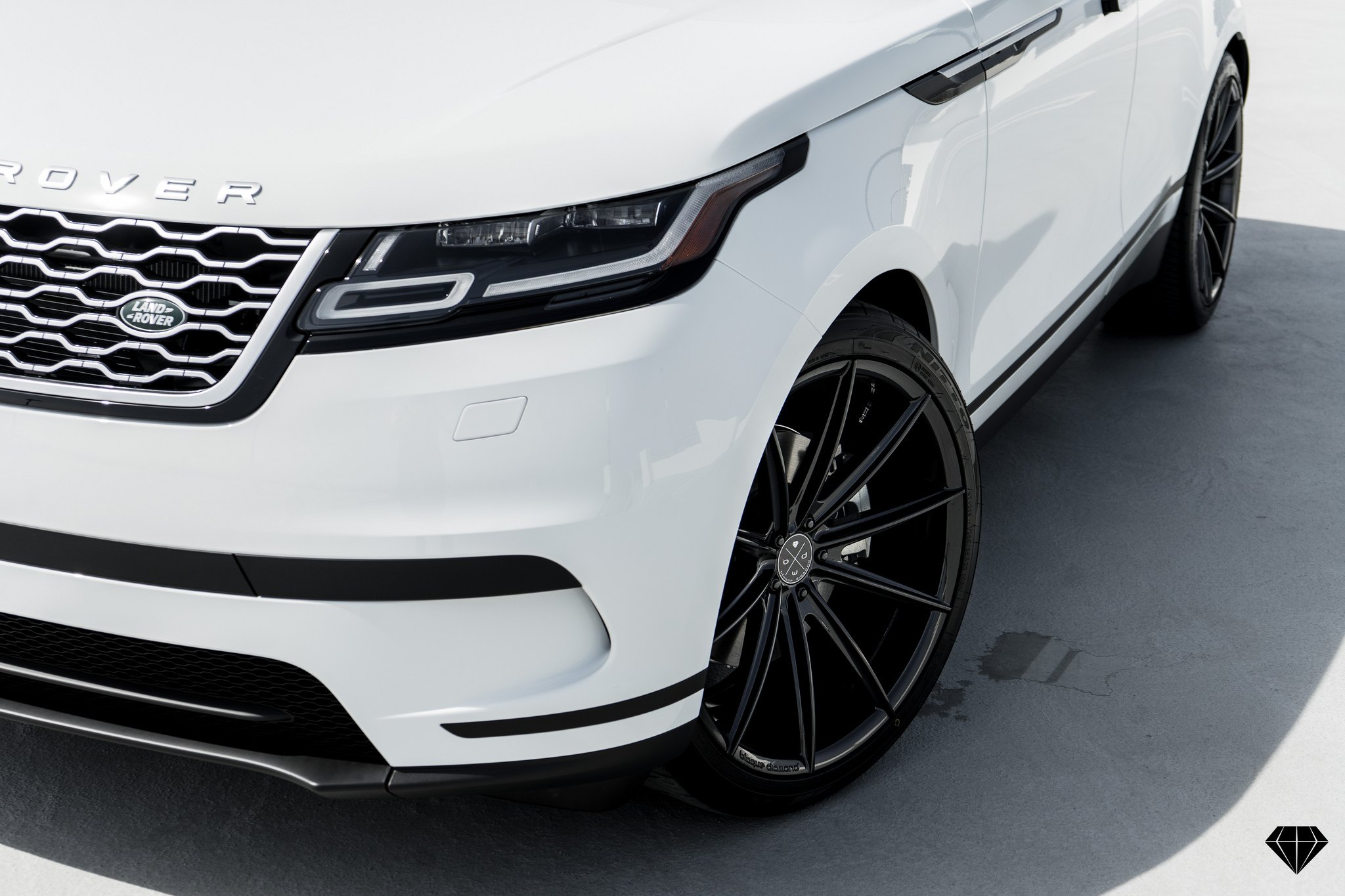 White Range Rover Velar with Aftermarket Headlights - Photo by Blaque Diamond Wheels