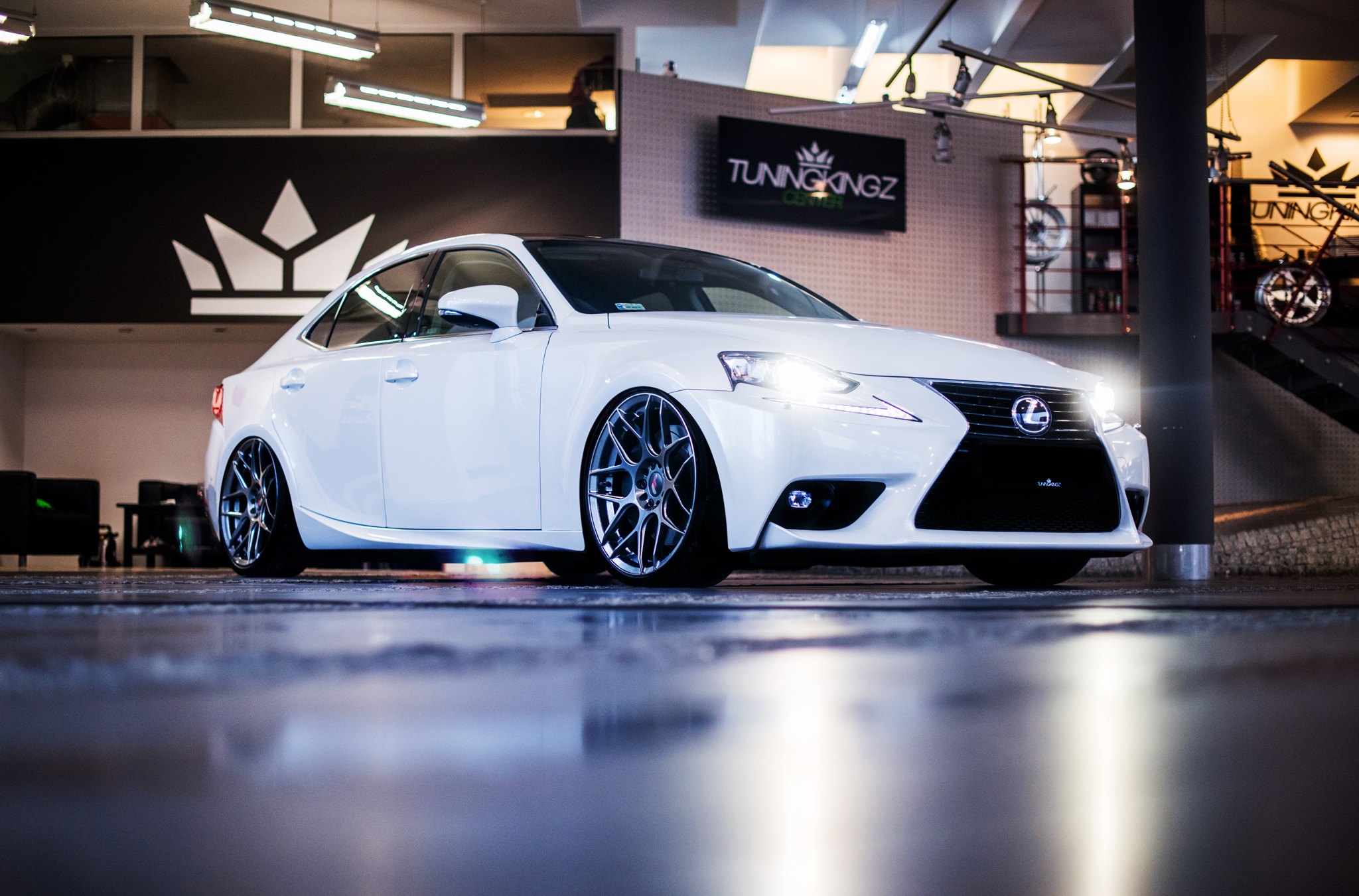 Front Bumper with Fog Lights on White Lexus IS - Photo by JR Wheels