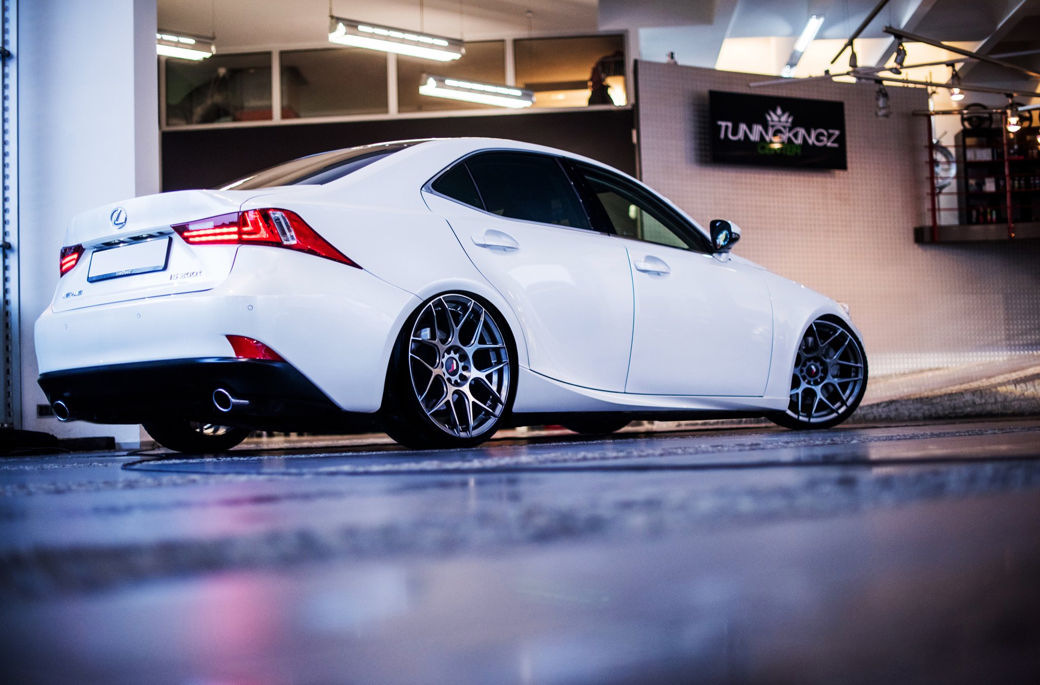 Red LED Taillights on White Lexus IS 200T - Photo by JR Wheels
