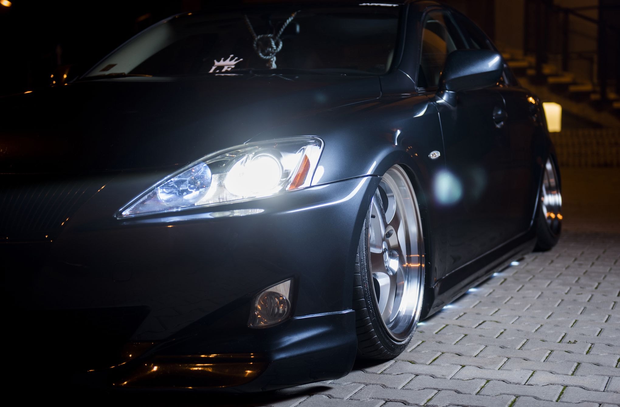 Aftermarket Projector Headlights on Black Lexus IS - Photo by JR Wheels