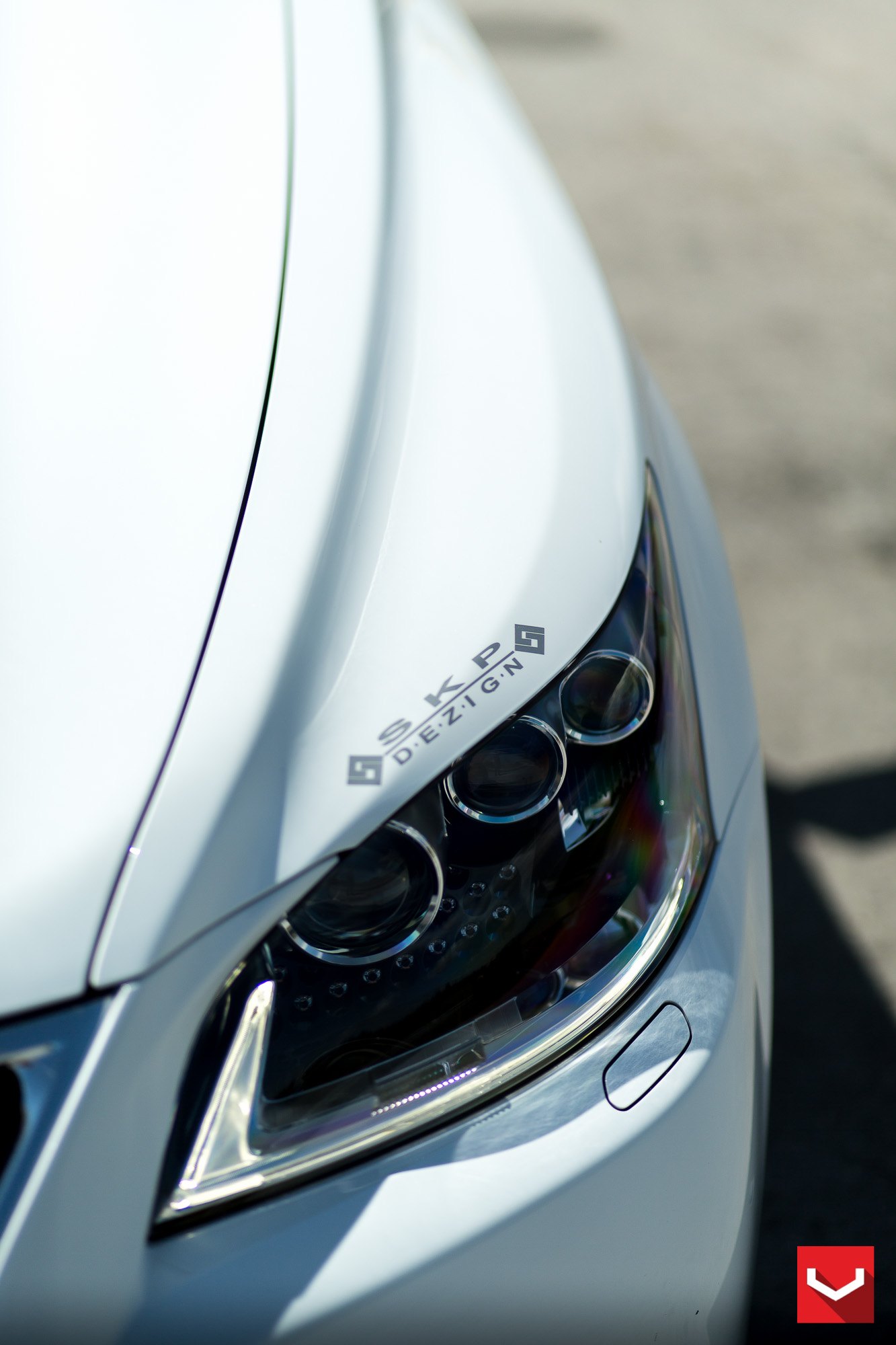 White Lexus LS with Custom Headlights - Photo by Vossen