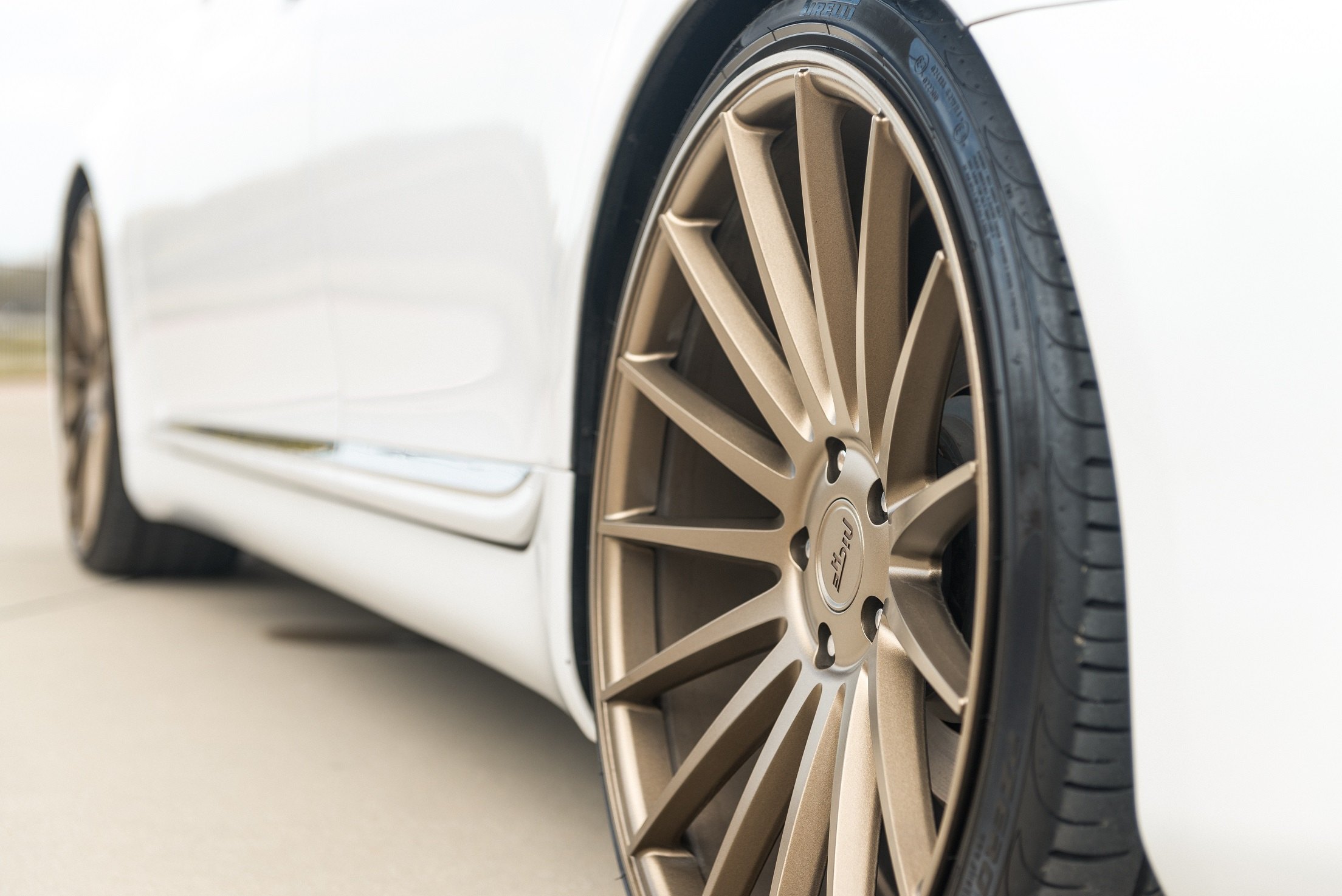 White Lexus LS with Form Bronze Niche Wheels - Photo by Niche