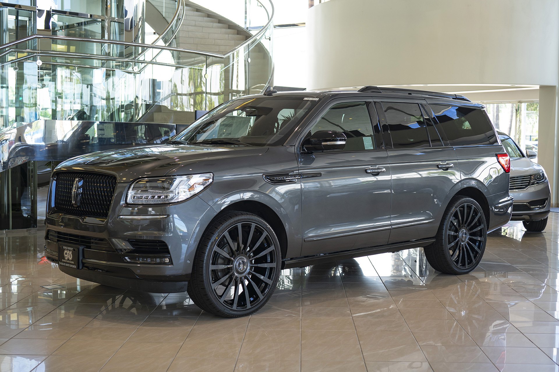Gray Lincoln Navigator with Crystal Clear Headlights - Photo by Forgiato