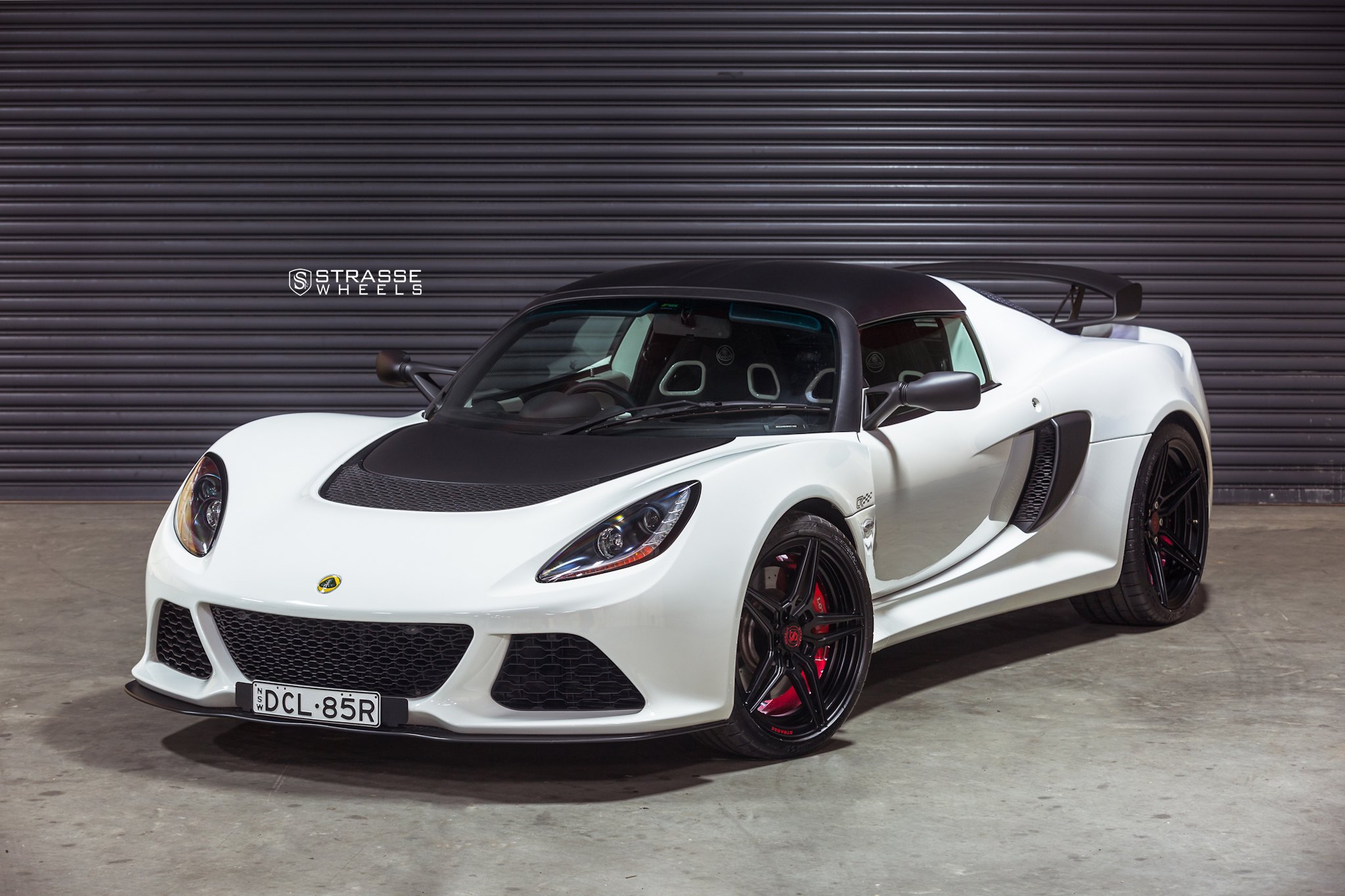 White Lotus Exige with Aftermarket Body Kit - Photo by Strasse Forged