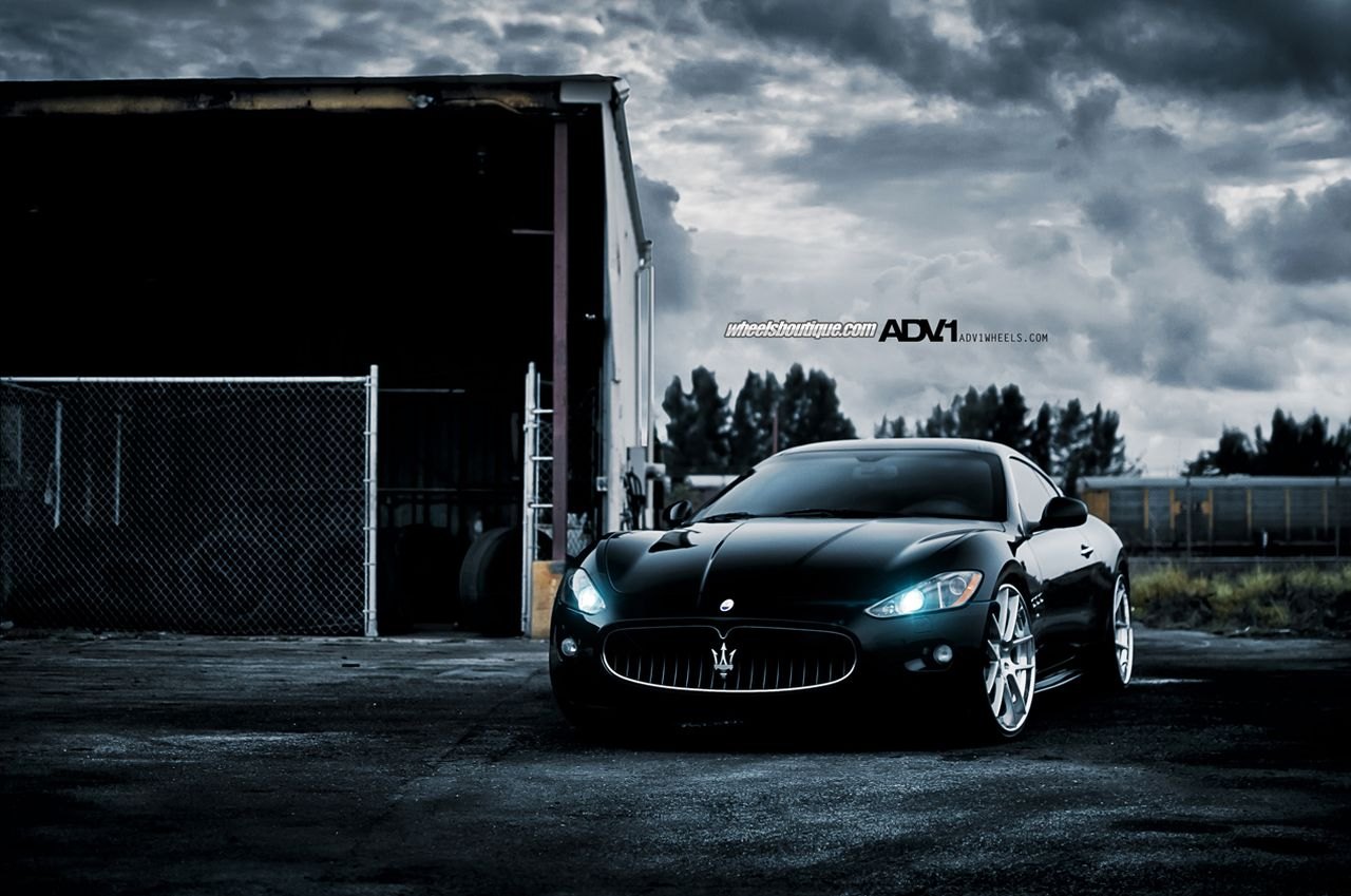 Black Maserati Granturismo with Aftermarket Headlights - Photo by ADV.1