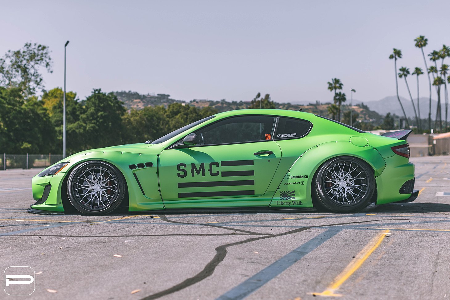 Green Maserati Granturismo with Aftermarket Fender Flares - Photo by PUR Wheels