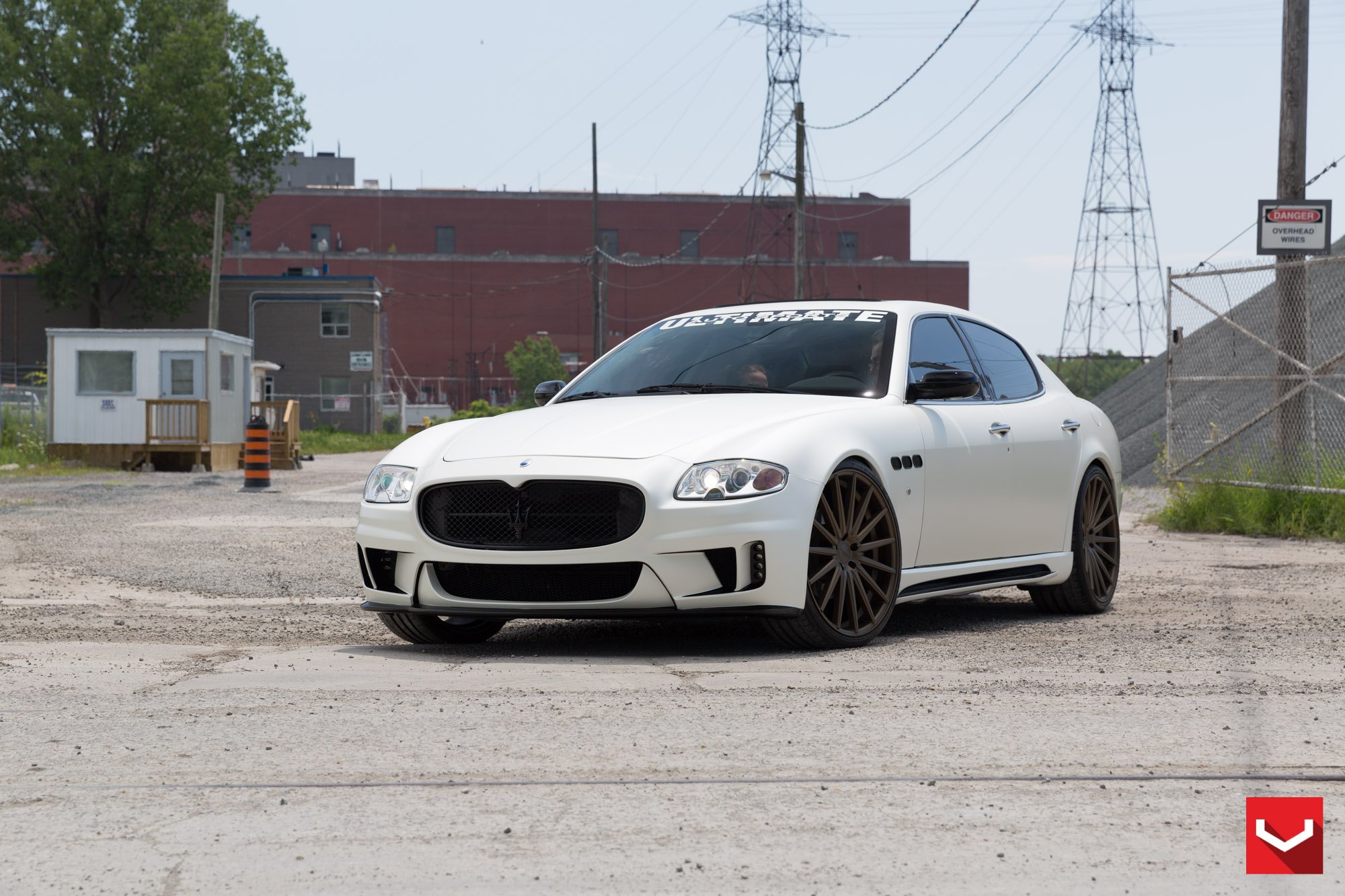 White Maserati Quattroporte with Aftermarket Side Skirts - Photo by Vossen