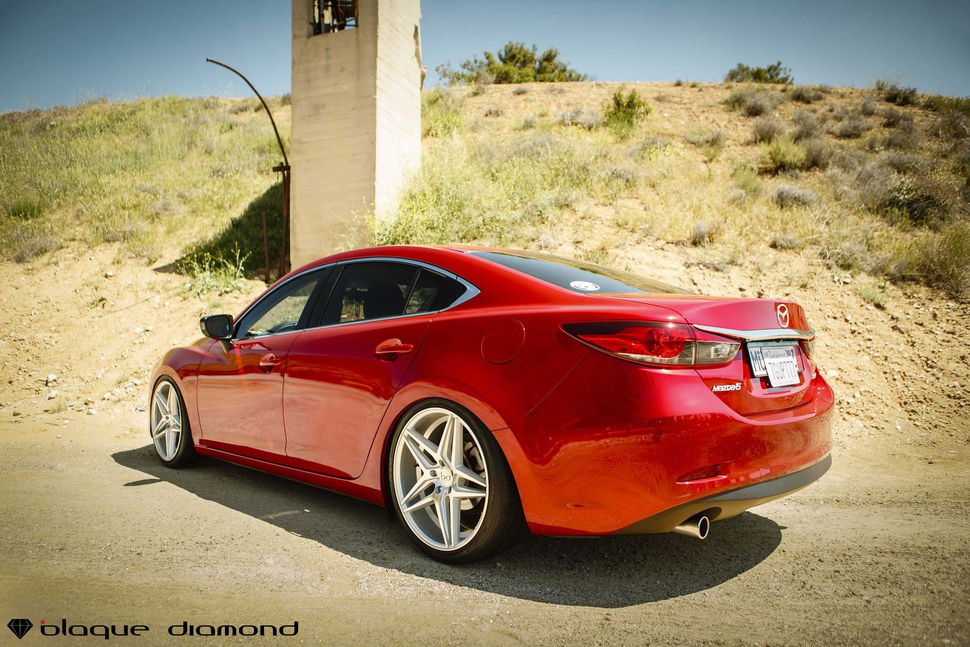 Aftermarket Rear Diffuser on Red Mazda 6 - Photo by Blaque Diamond