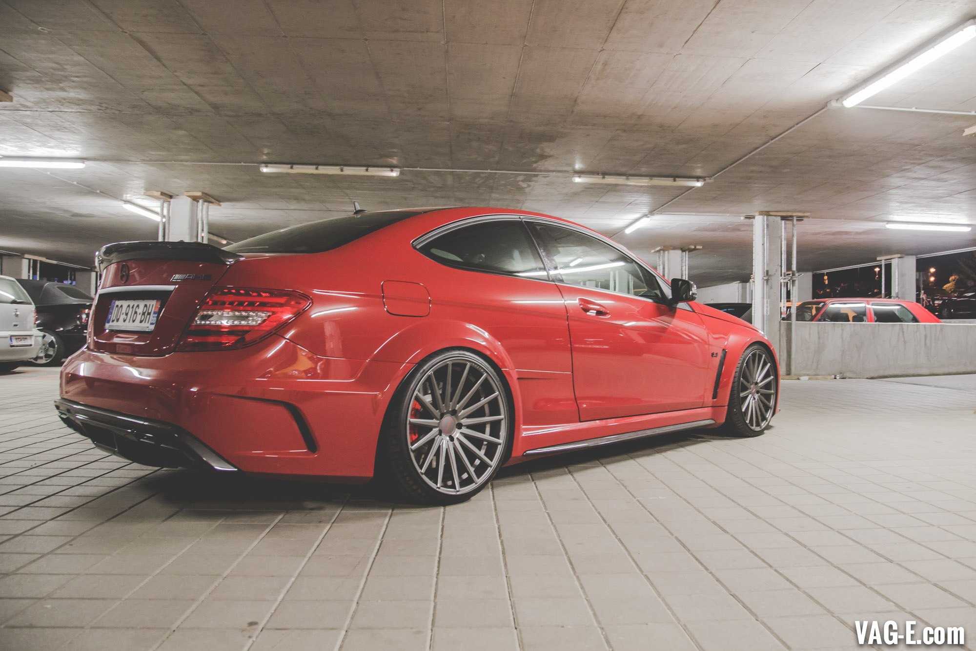 Rear Lip Spoiler on Red Mercedes C Class - Photo by Vossen