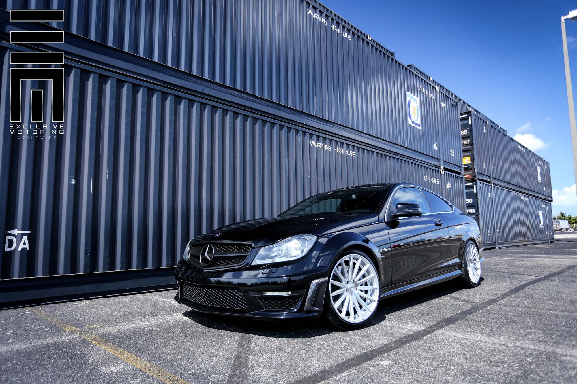 Gloss Black Mercedes C Class with Custom Front Bumper - Photo by Vossen