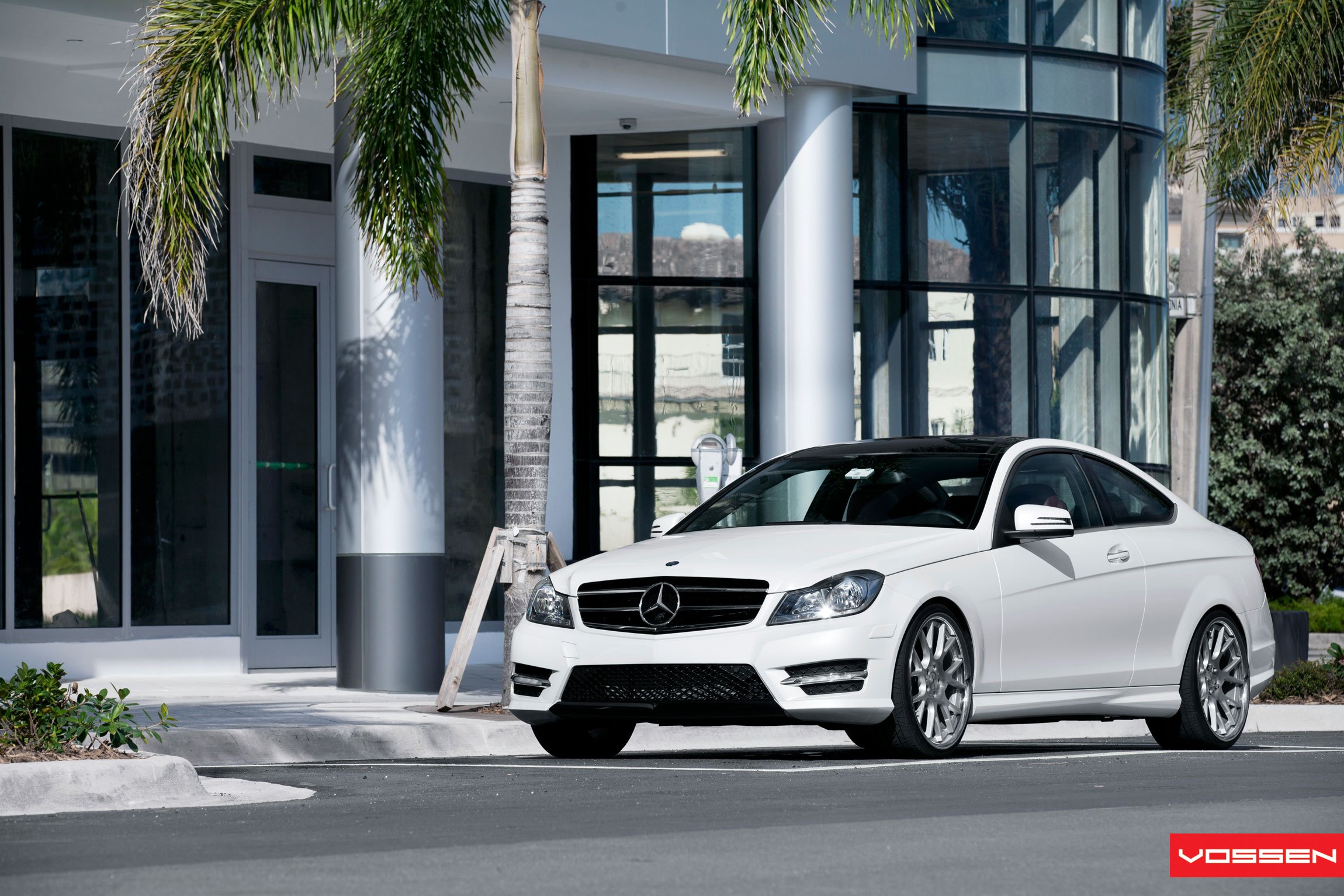 Crystal Clear Custom Headlights on White Mercedes C Class - Photo by Vossen