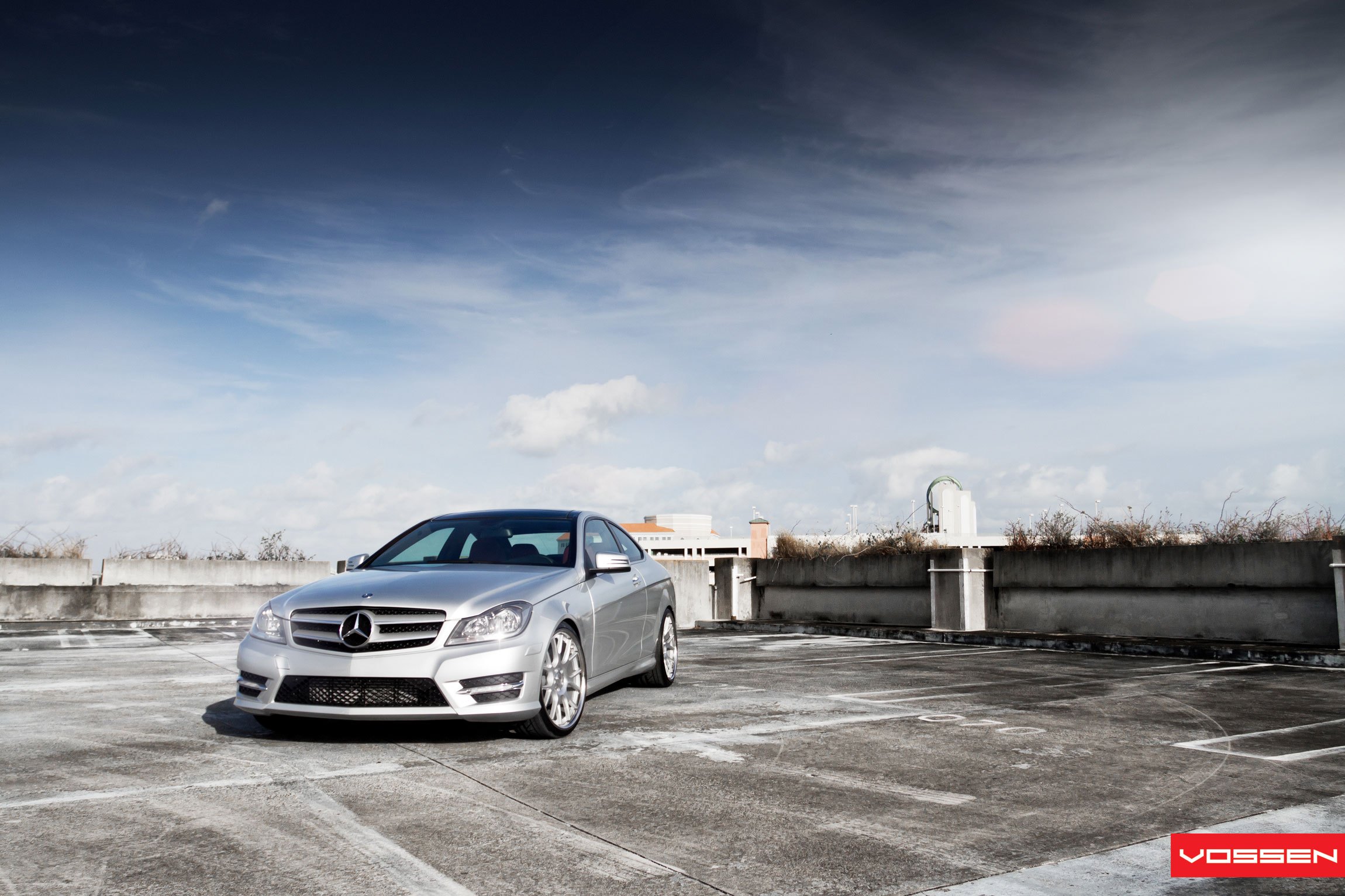 Silver Mercedes C Class with Custom Projector Headlights - Photo by Vossen