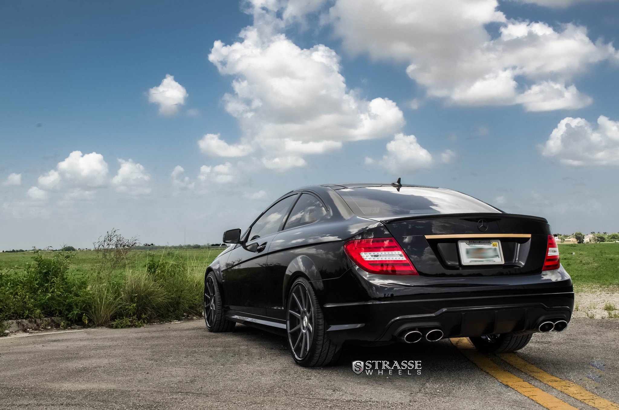 Black Mercedes C-Class with Factory Style Rear Lip Spoiler - Photo by Strasse Forged