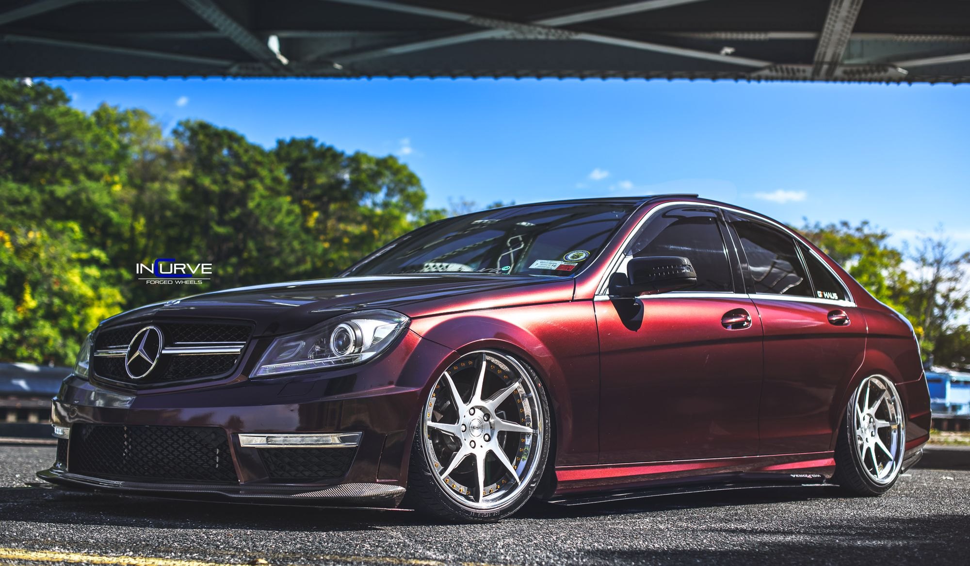 Aftermarket Halo Headlights on Red Mercedes C Class - Photo by Incurve Wheels