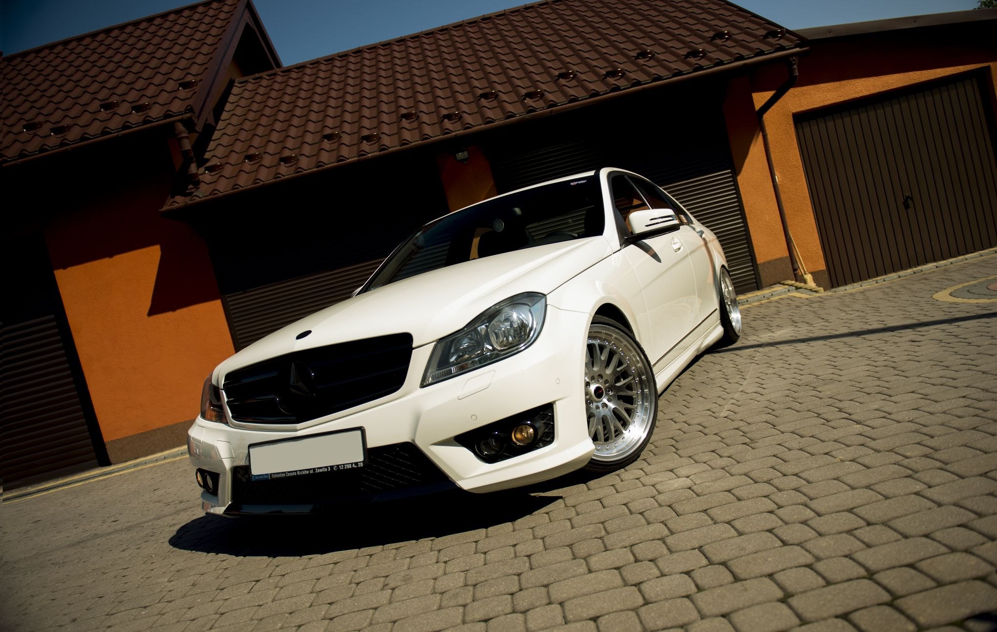 White Mercedes C Class with Custom Blacked Out Grille - Photo by JR Wheels