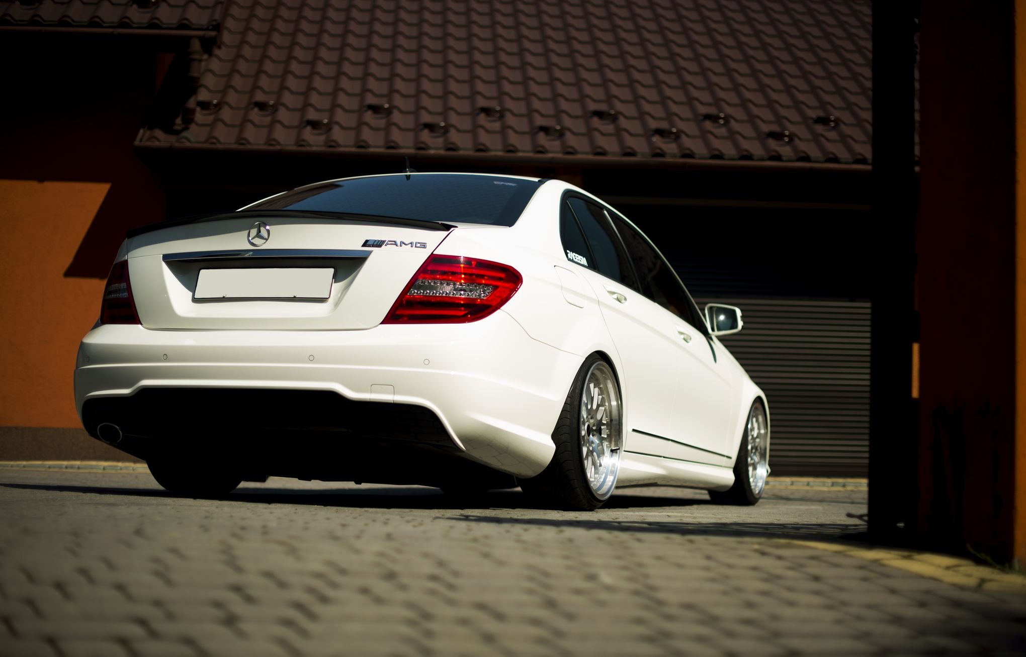 White Mercedes C Class with Rear Lip Spoiler - Photo by JR Wheels