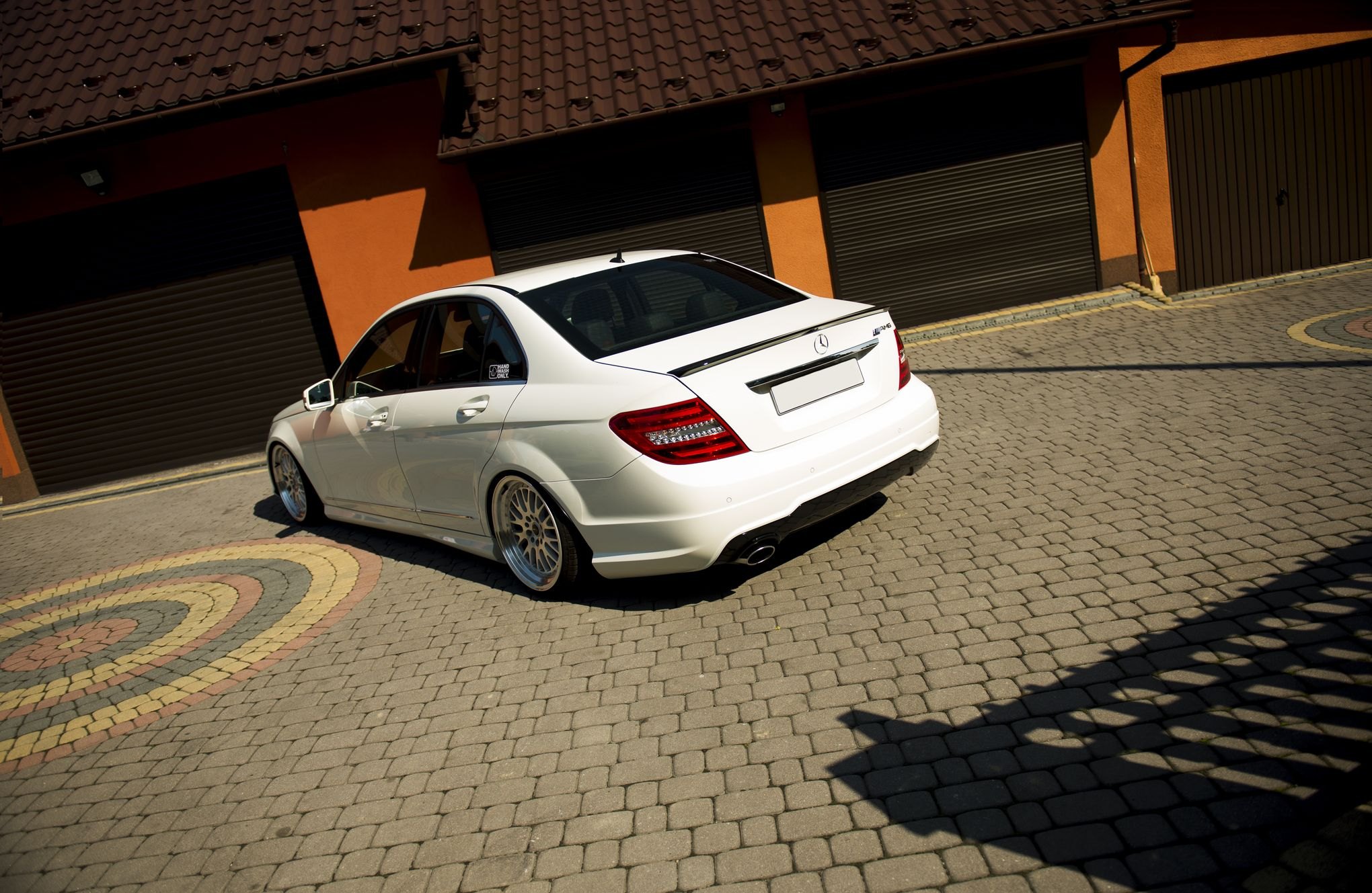 Red Clear LED Taillights on White Mercedes C Class - Photo by JR Wheels
