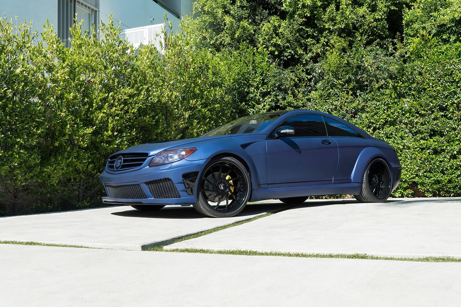 Matte Blue Mercedes CL Class with Aftermarket Headlights - Photo by Forgiato