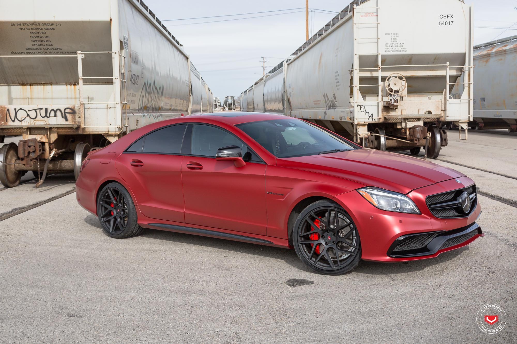 Blacked Out Mesh Grille on Red Mercedes CLS Class - Photo by Vossen