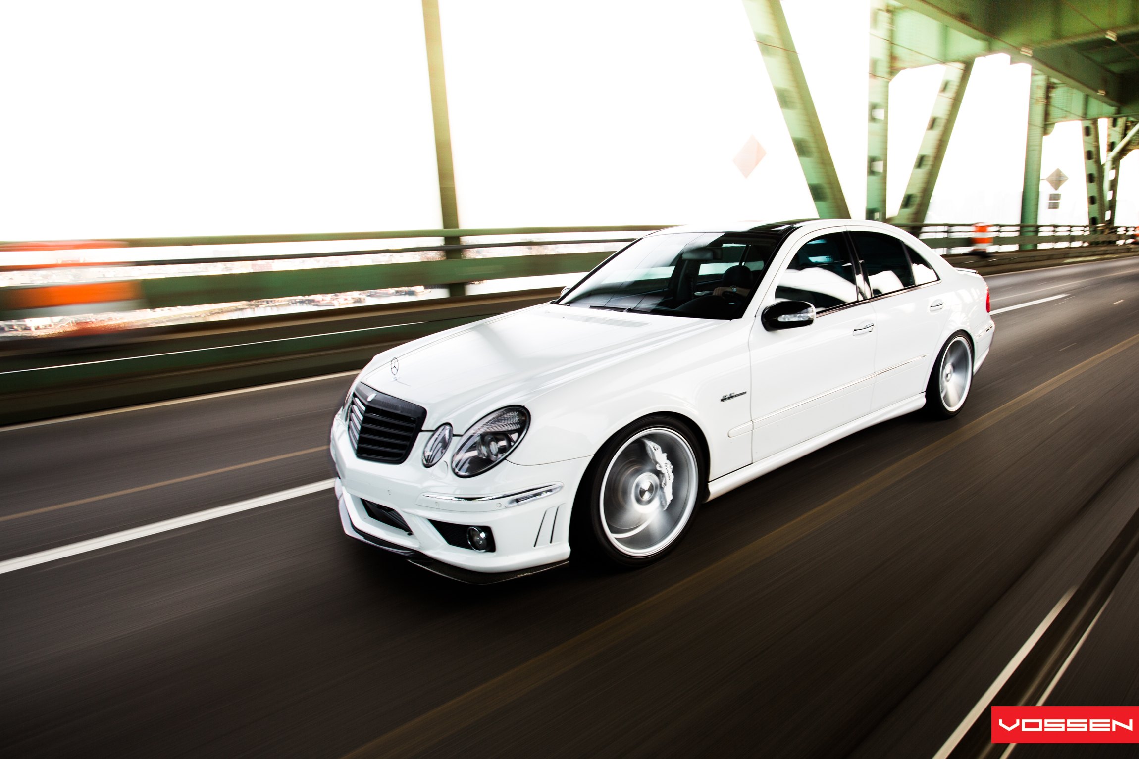White Mercedes E Class with Custom Front Lip - Photo by Vossen