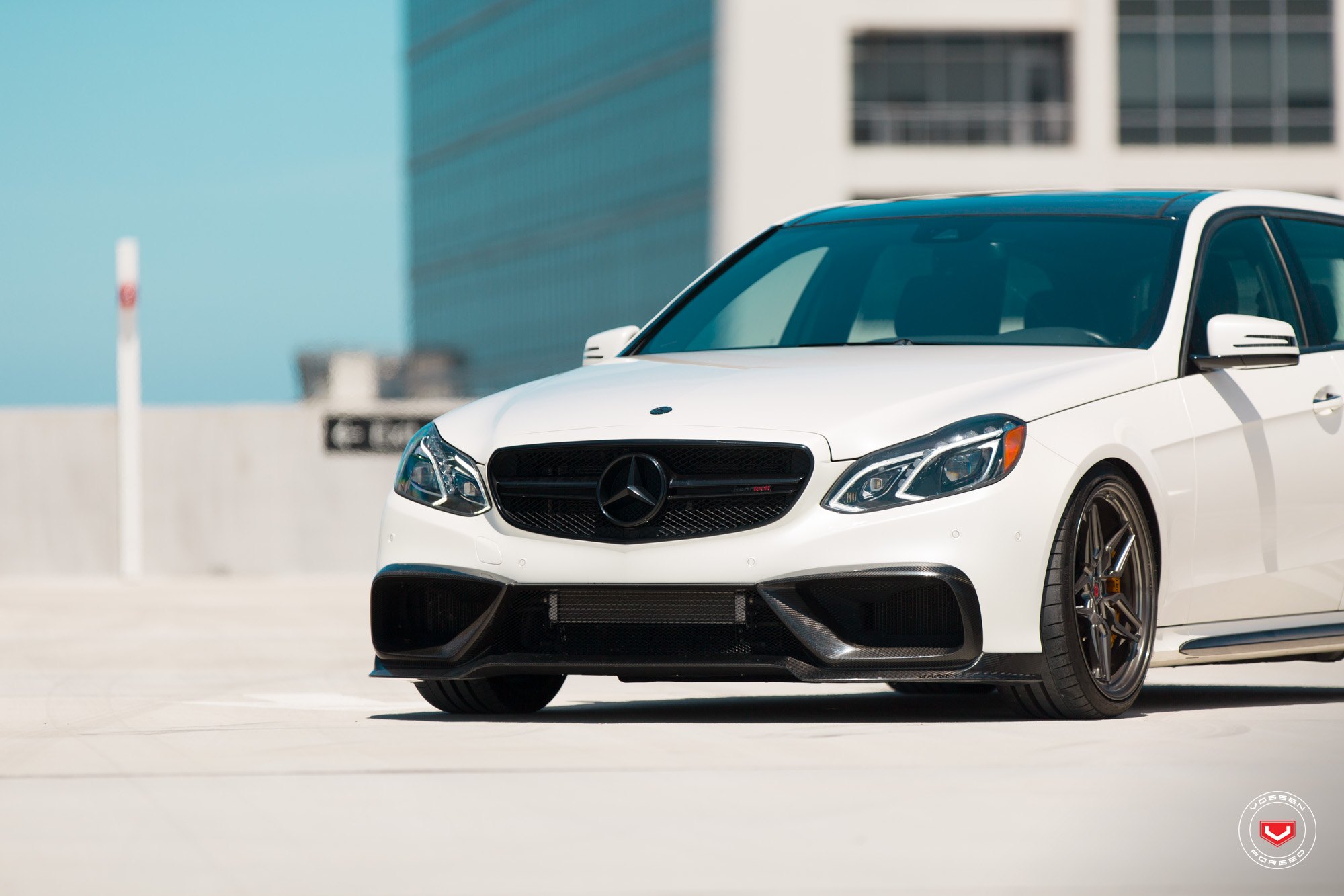 Blacked Out Mesh Grille on White Mercedes E Class - Photo by Vossen