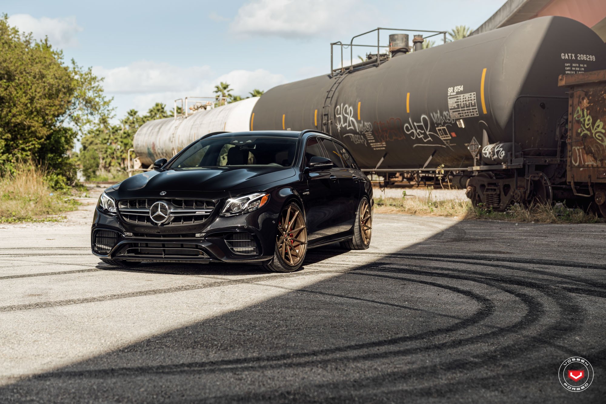 Black Mercedes E Class with Aftermarket Headlights  - Photo by Vossen