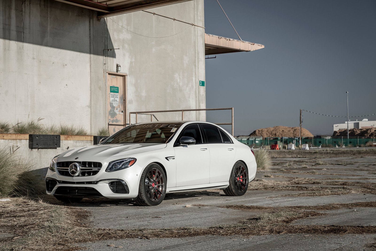 White Mercedes E Class with Custom Front Bumper - Photo by Vorsteiner