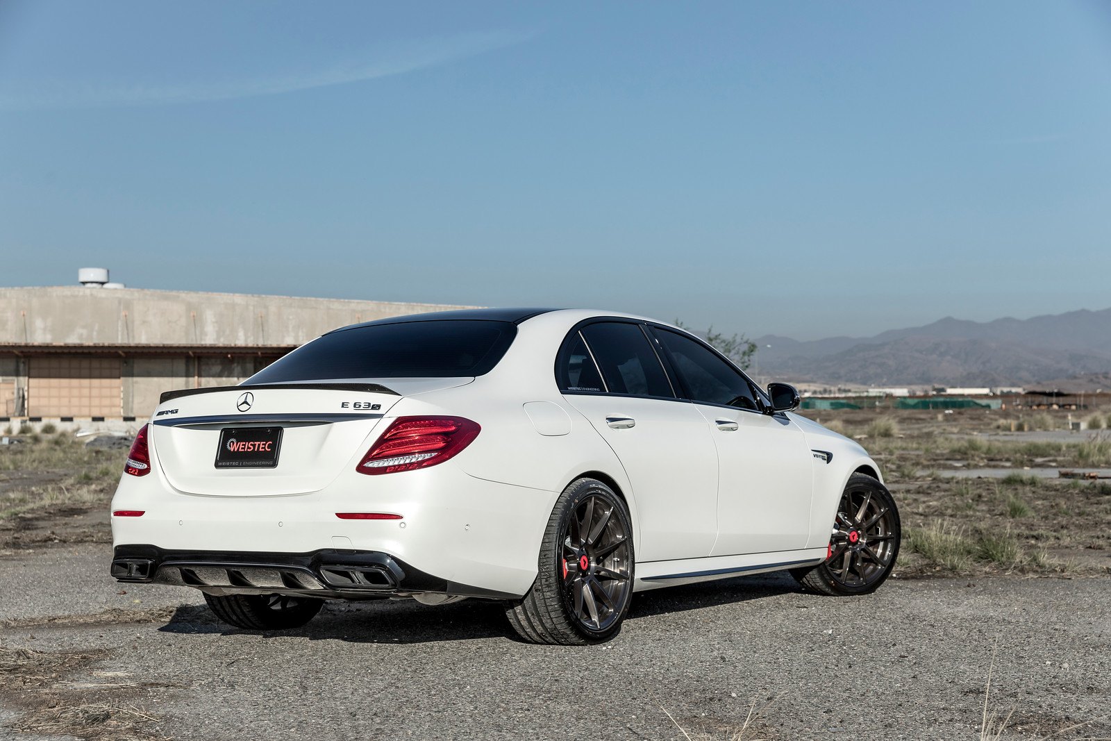 White Mercedes E Class with Red LED Taillights  - Photo by Vorsteiner