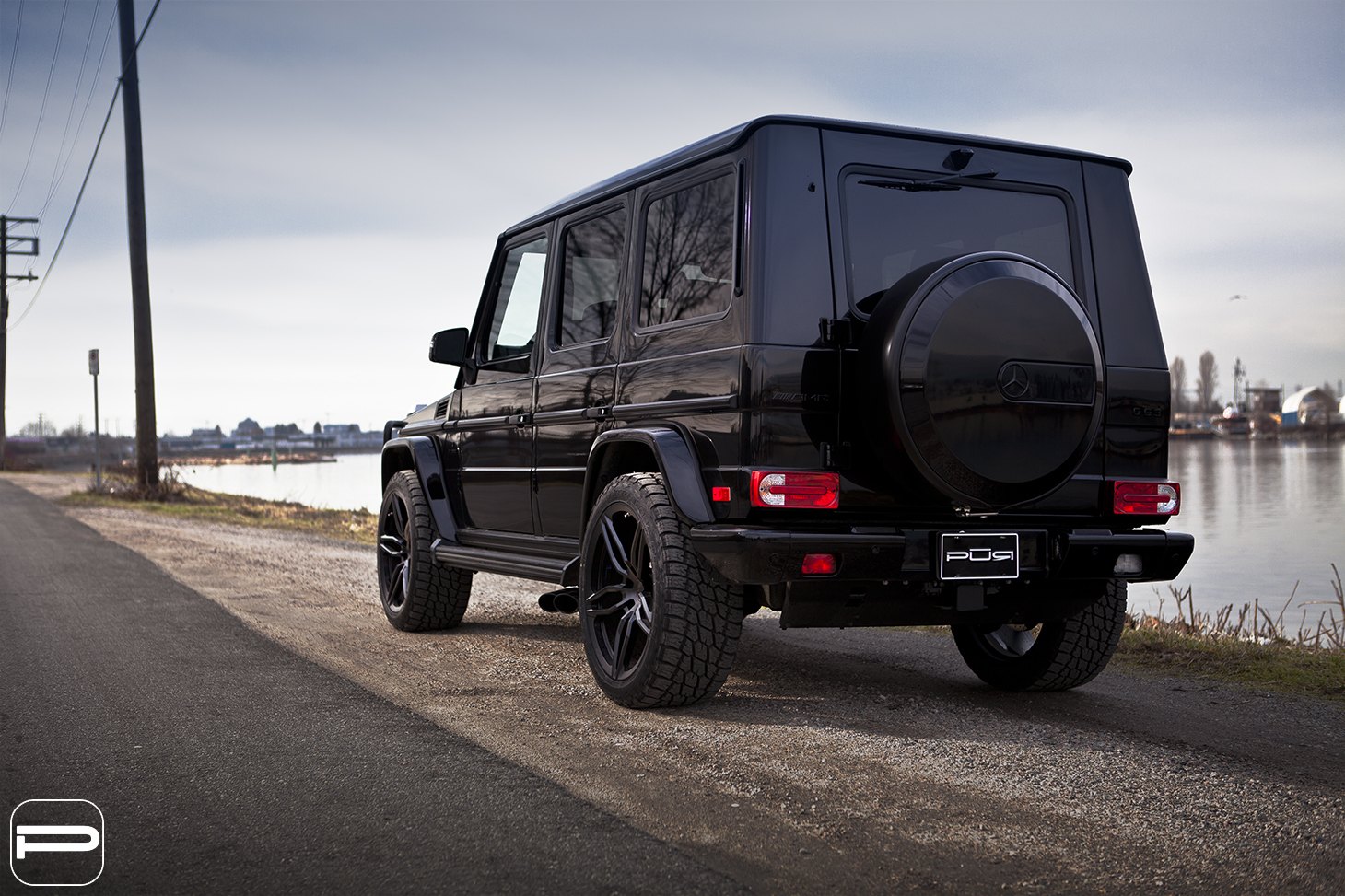 Black Mercedes G Class with Spare Tire Kit - Photo by PUR Wheels