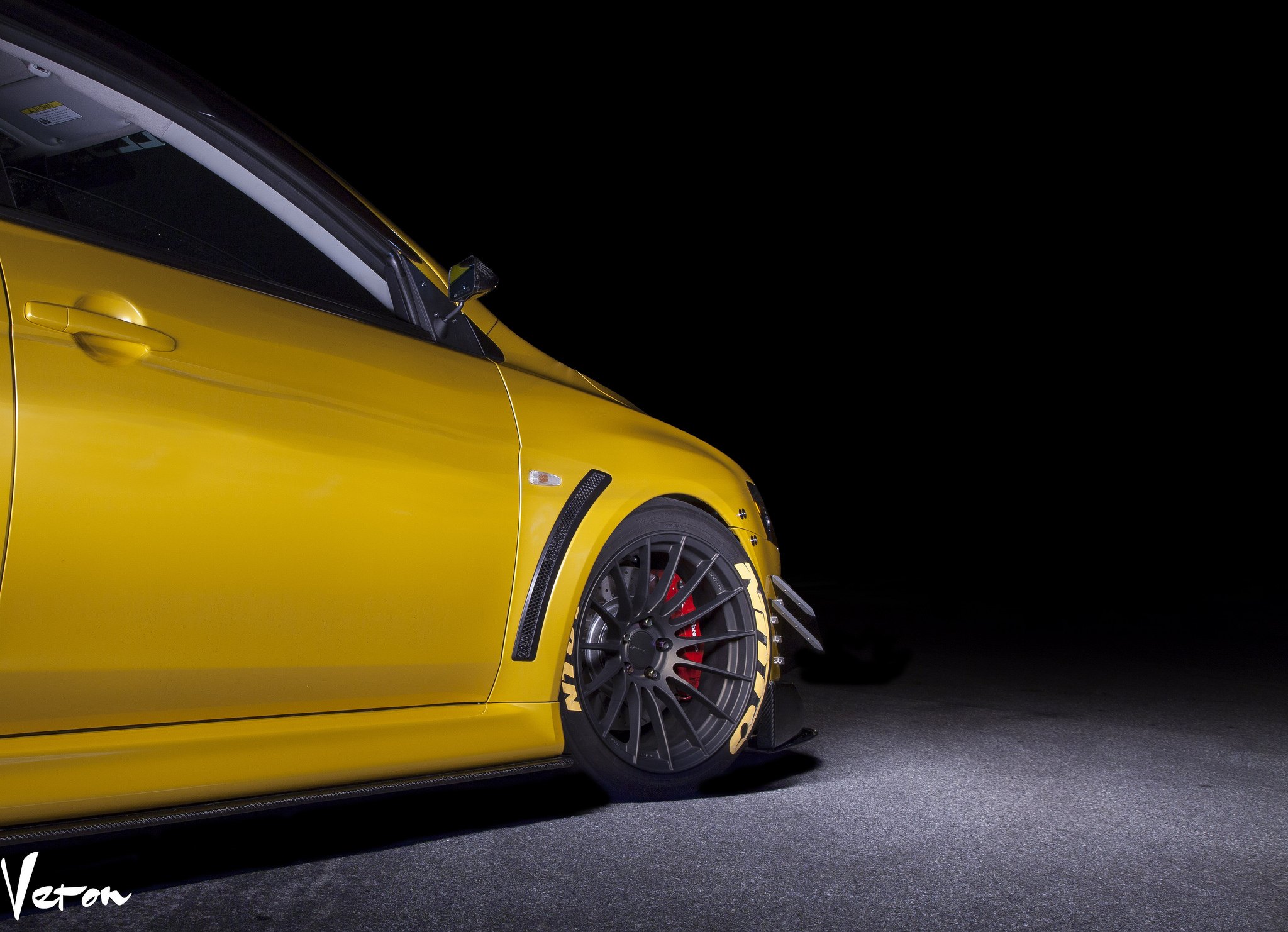 Yellow Mitsubishi Evolution with Carbon Fiber Side Skirts - Photo by Manuel Veron