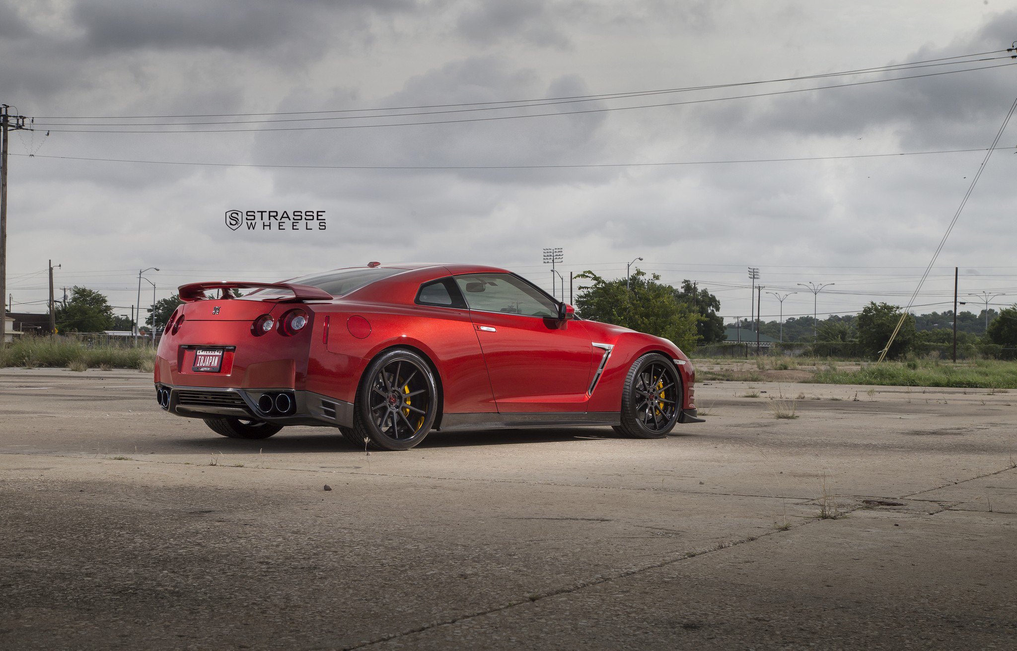 Rear Diffuser with Dual Exhaust Tips on Red Nissan GT-R - Photo by Strasse Forged
