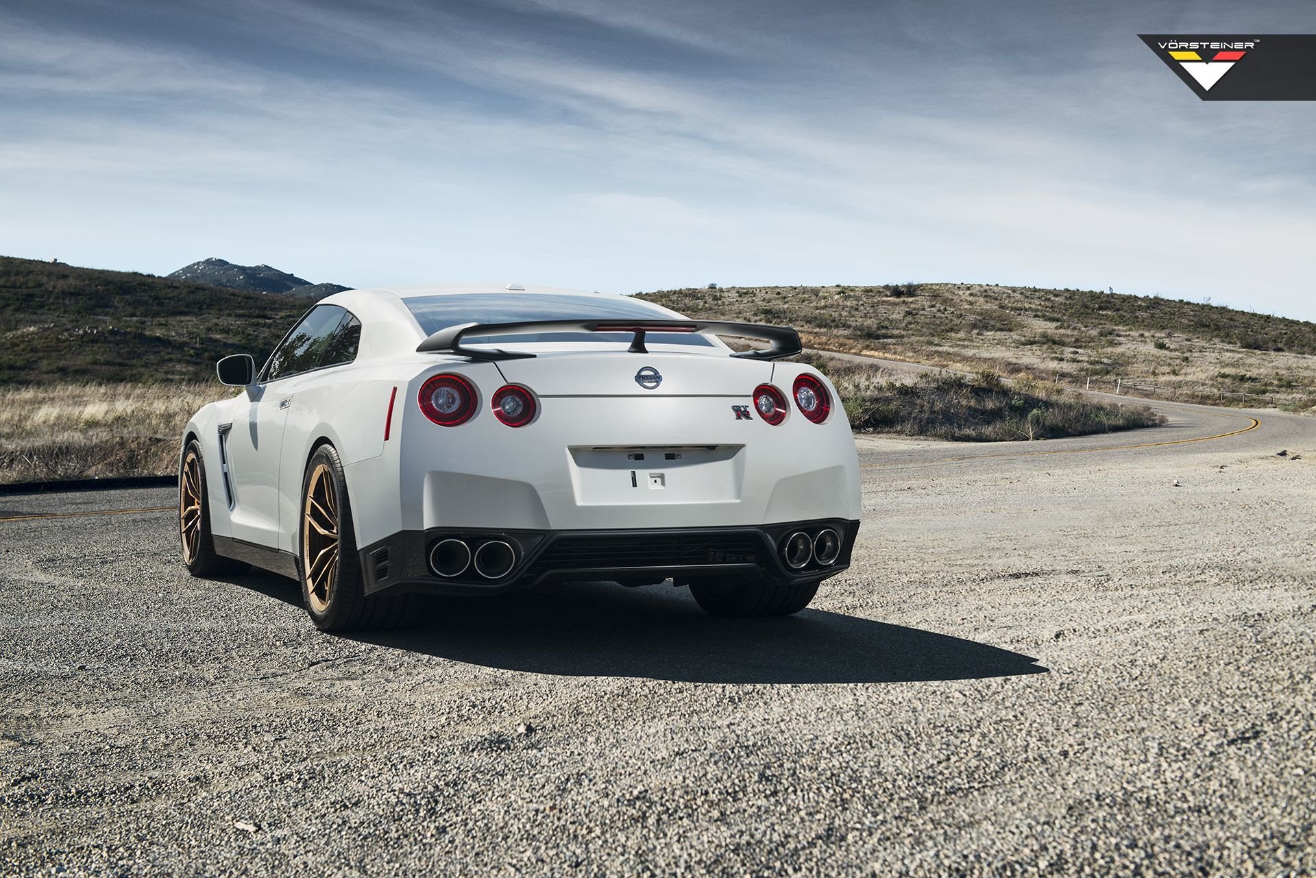 White Nissan GT-R with Aftermarket Rear Spoiler - Photo by Vorstiner