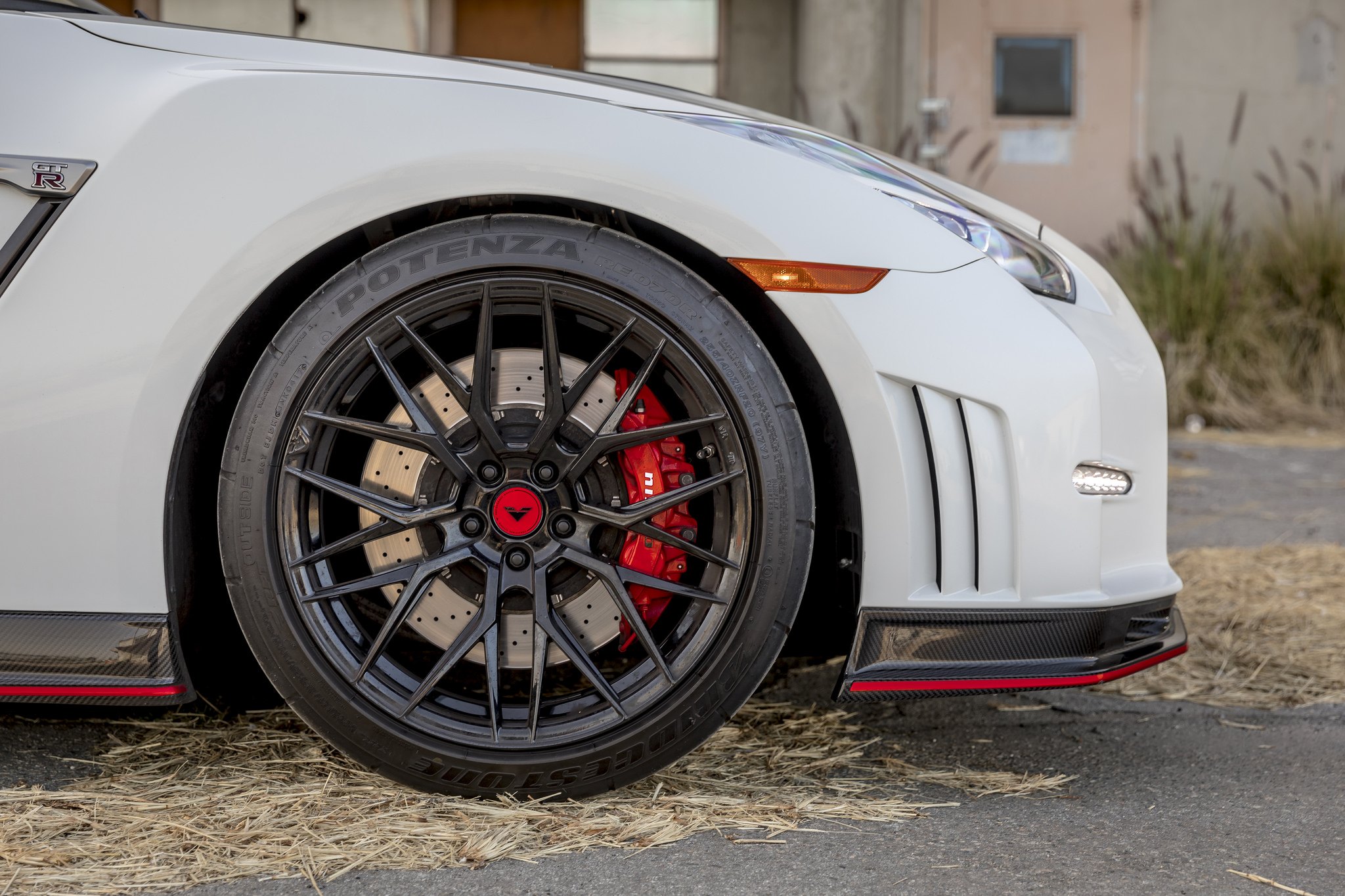 Bridgestone Potenza Tires on White Nissan GT-R - Photo by Vorsteiner