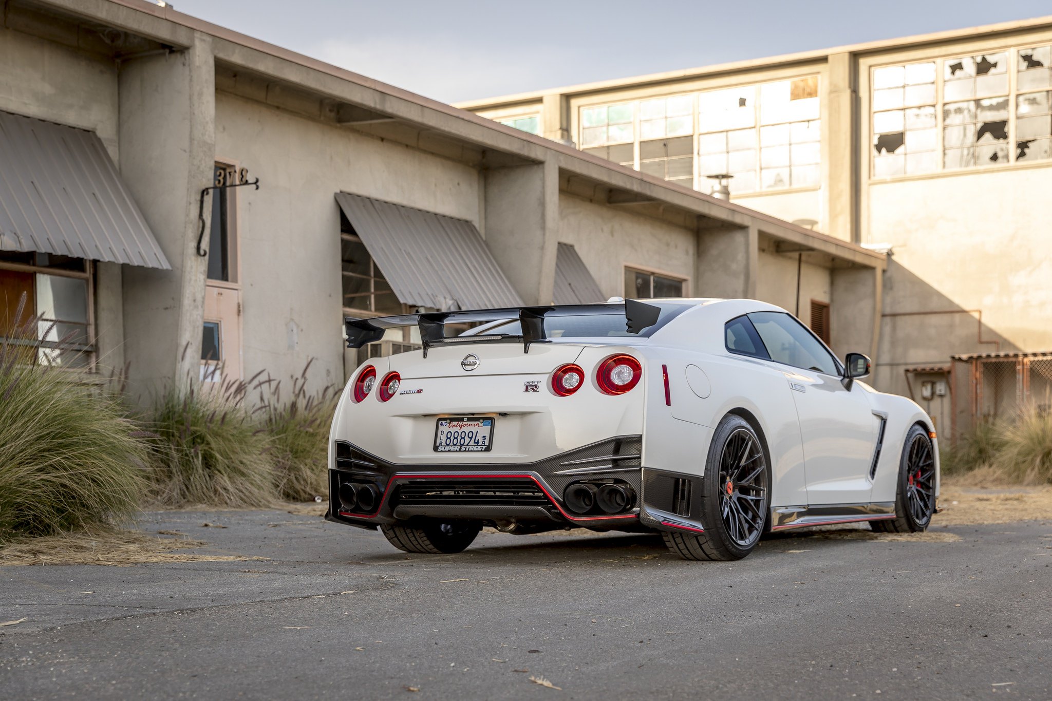 White Nissan GT-R with Custom Wing Spoiler - Photo by Vorsteiner