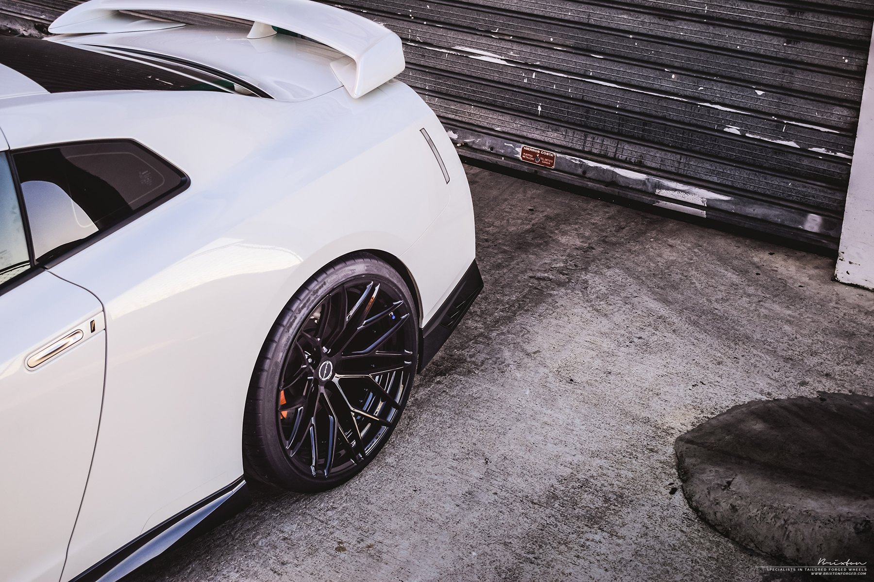White Nissan GT-R with Aftermarket Side Skirts - Photo by Brixton Forged Wheels